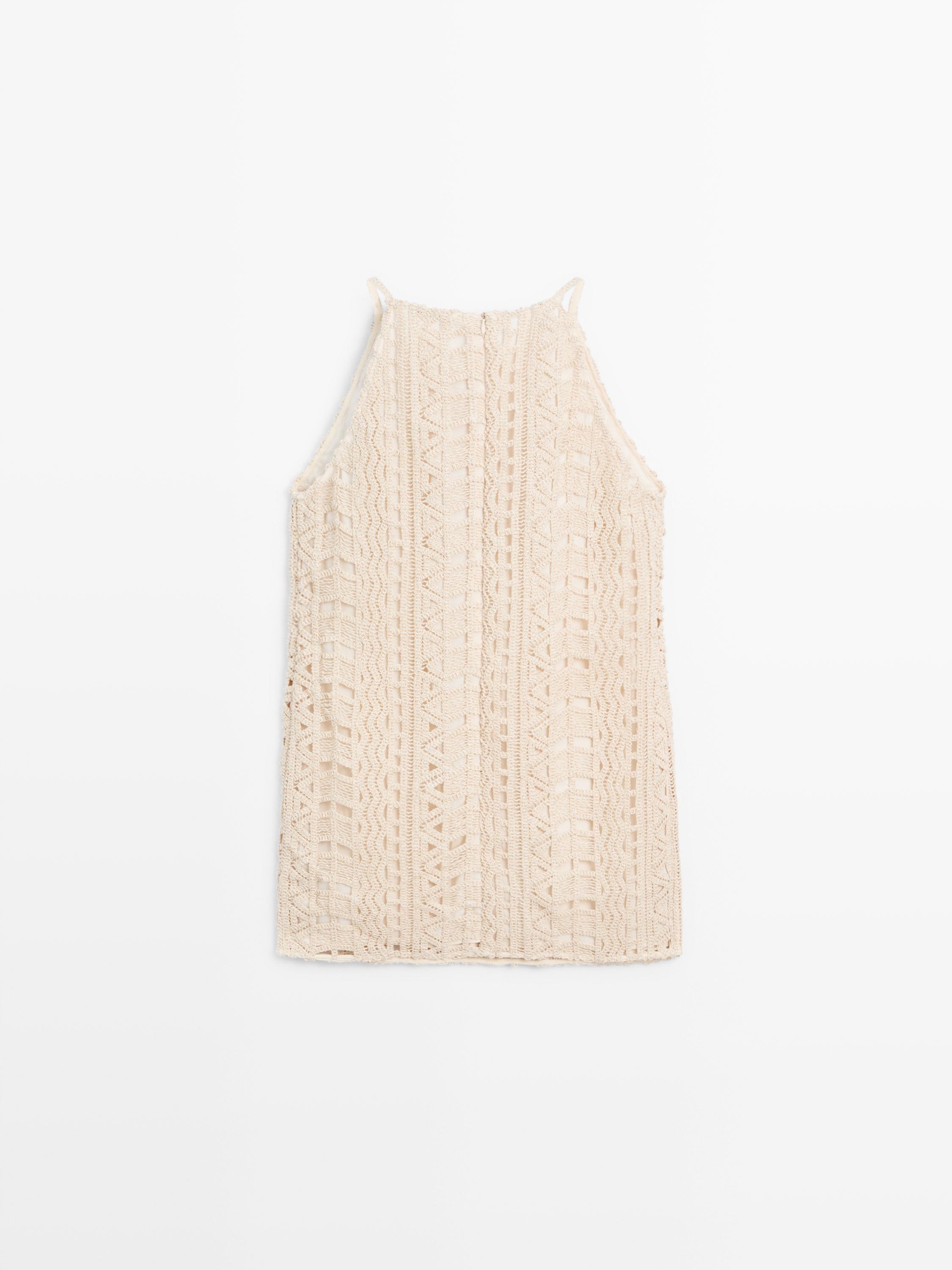 Robe courte ajourée métallisée