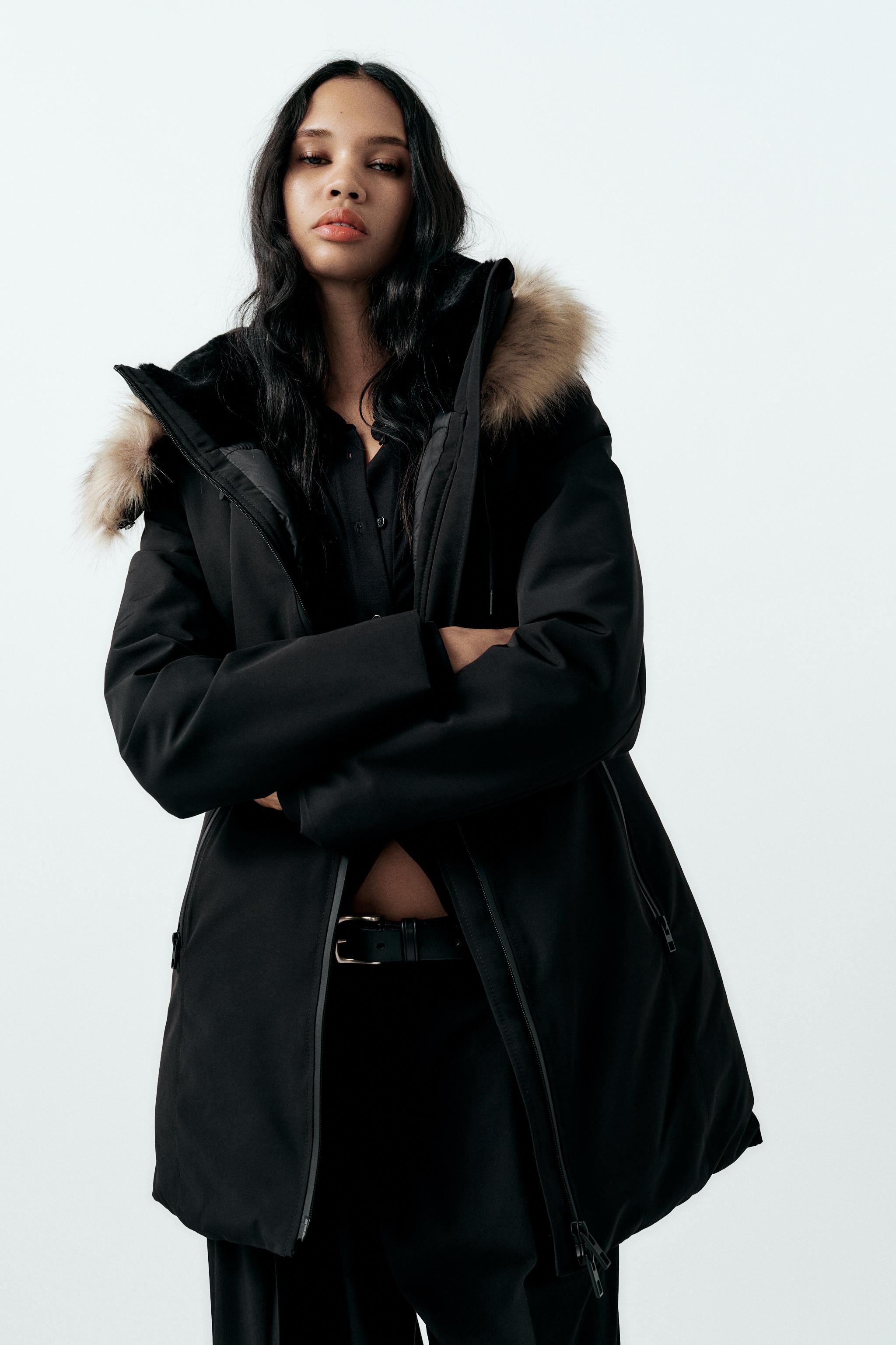 Black shiny coat with fur best sale hood zara