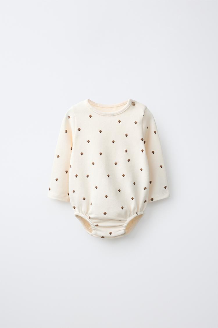 BODY ESTAMPADO SETAS