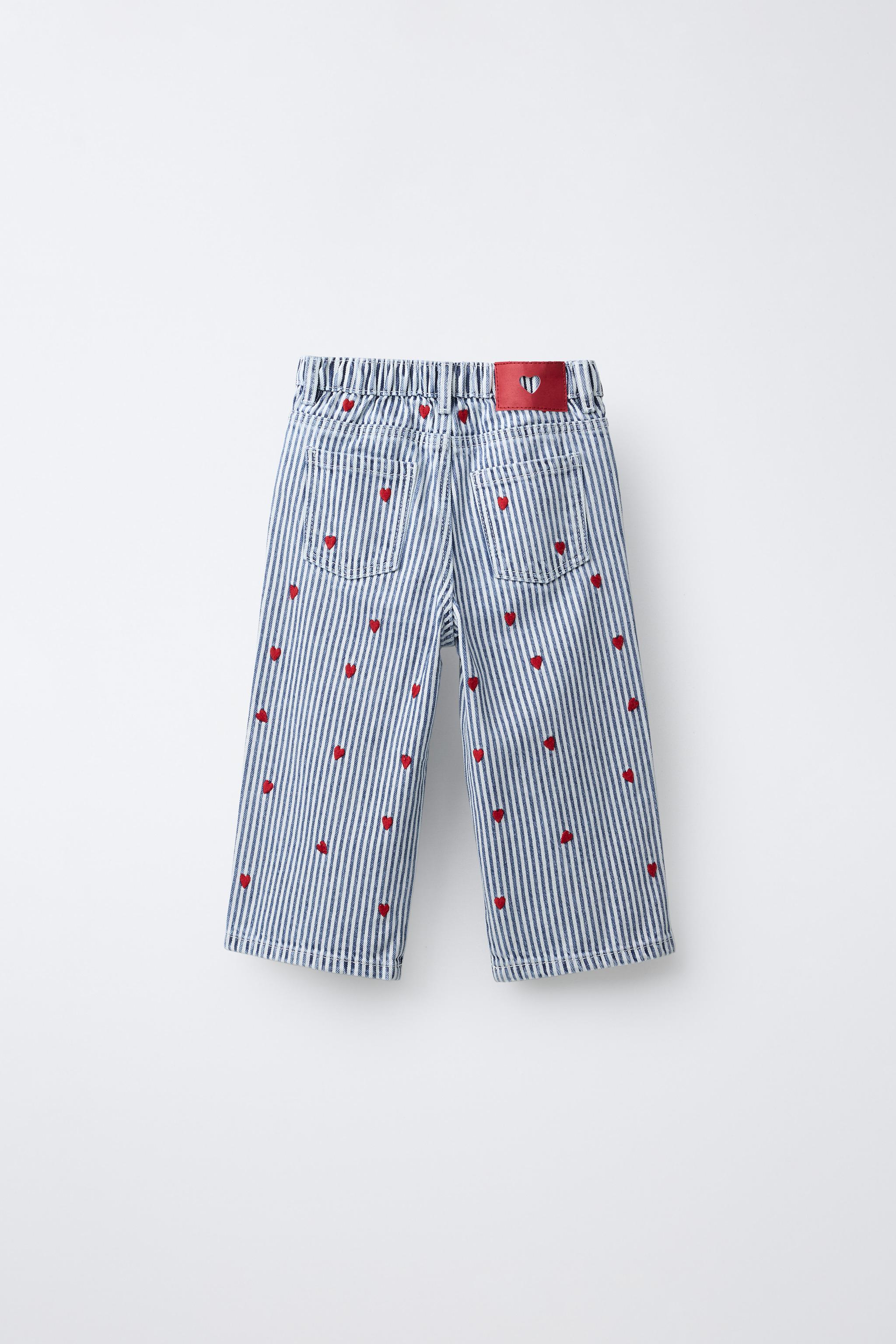 JEANS JUPE-CULOTTE À RAYURES ET CŒURS BRODÉS