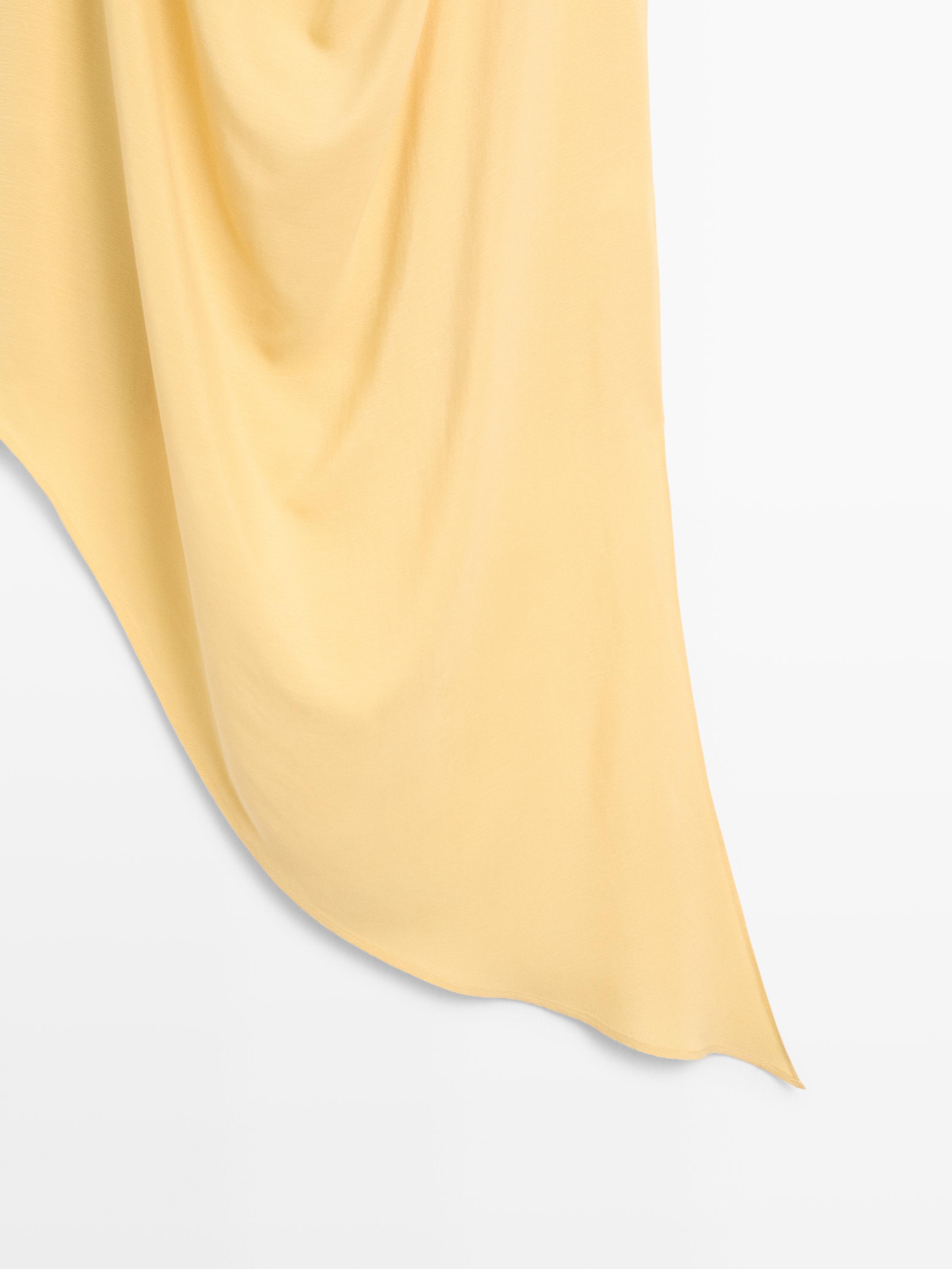 Long flowing asymmetric top