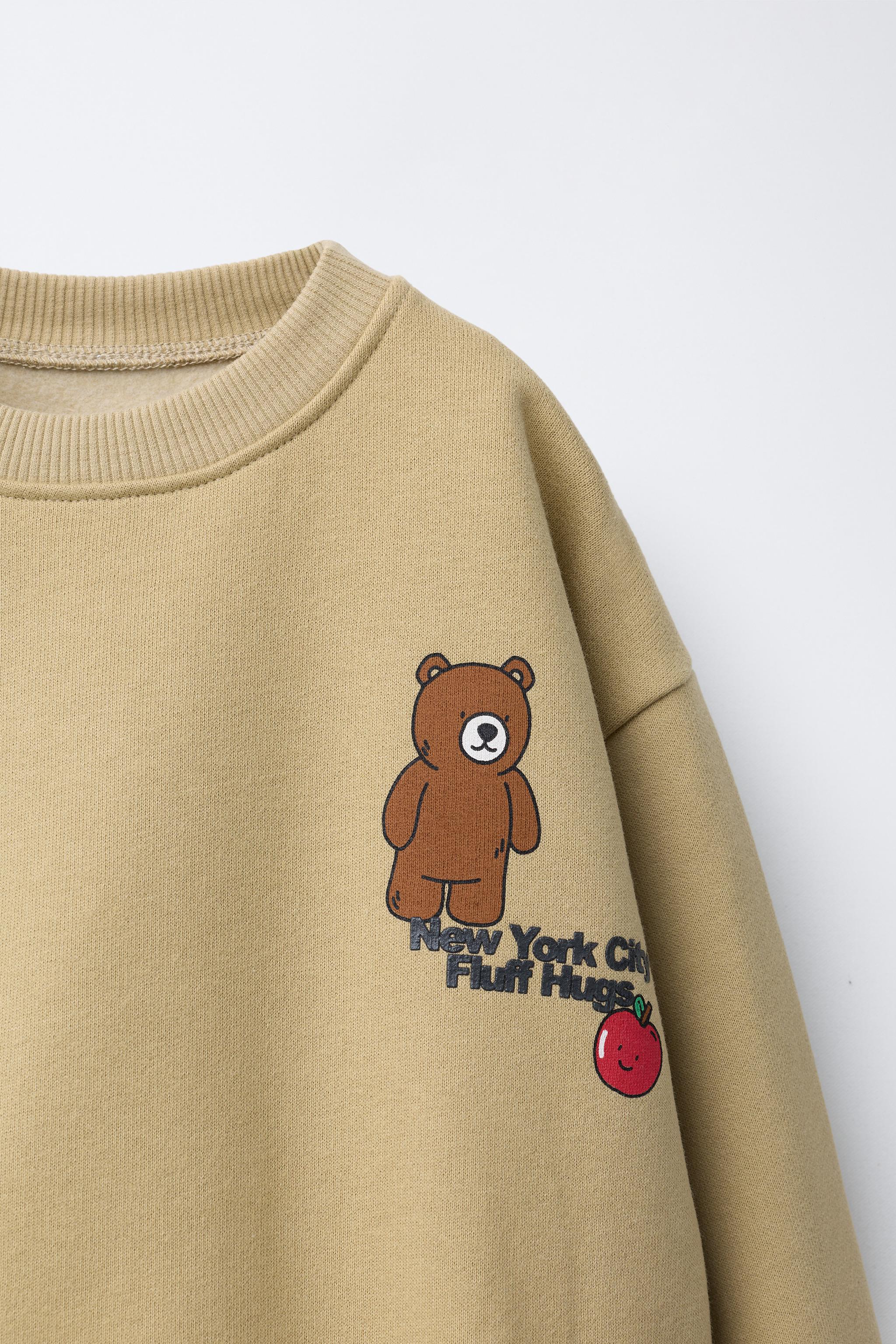 ANIMAL PRINT SWEATSHIRT