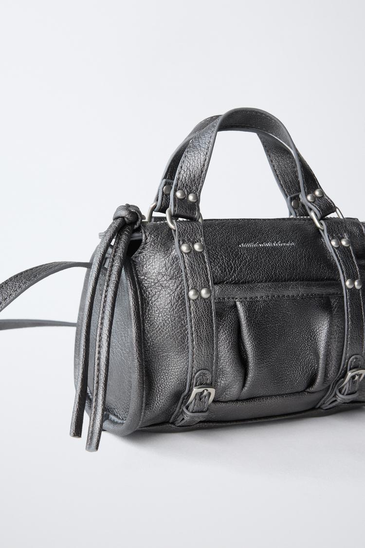 BOLSO CRUZADO CON TACHAS 3