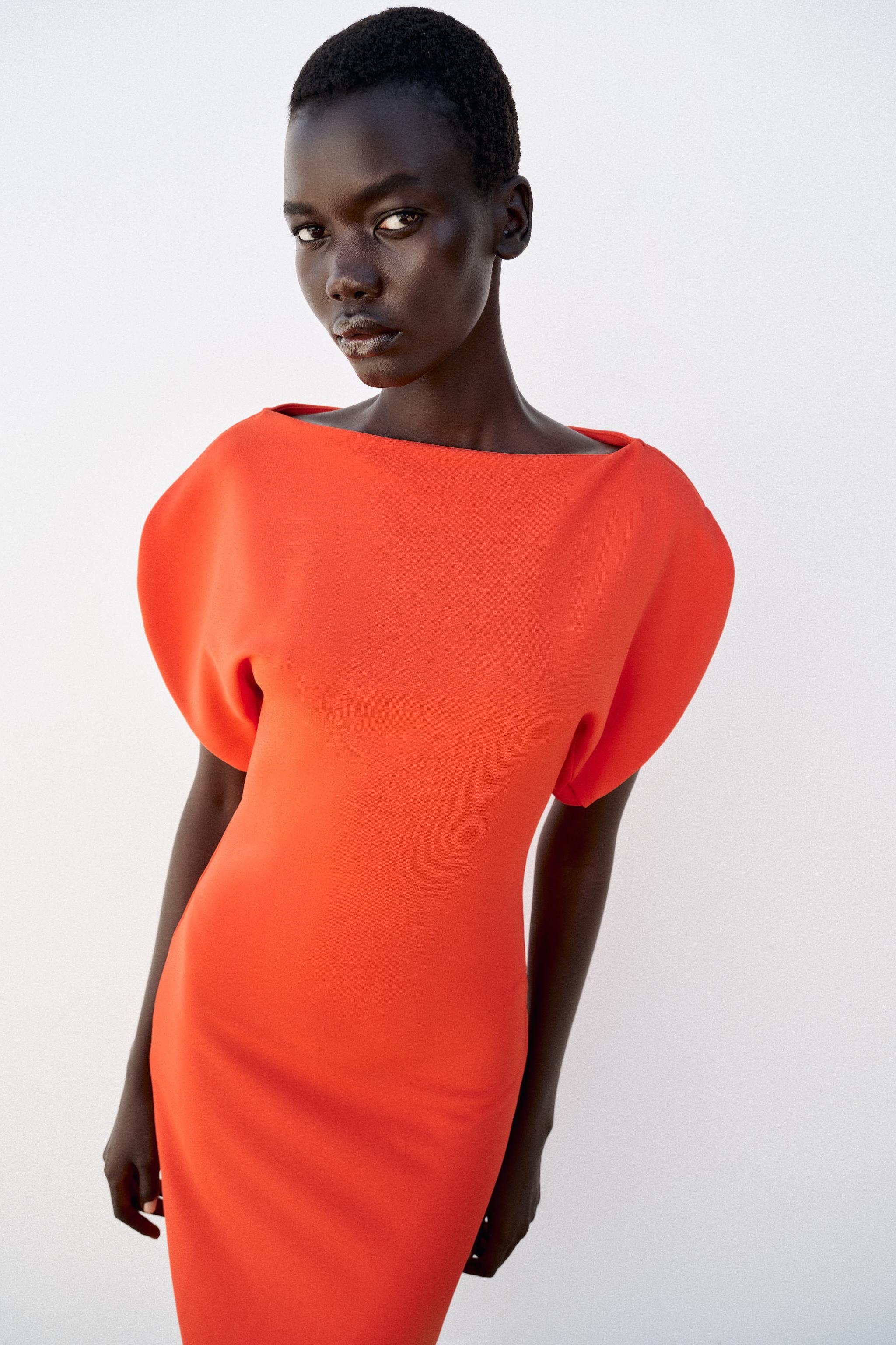 VOLUMINOUS MIDI DRESS