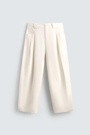 RELAXED FIT PLEATED TROUSERS - White by Zara