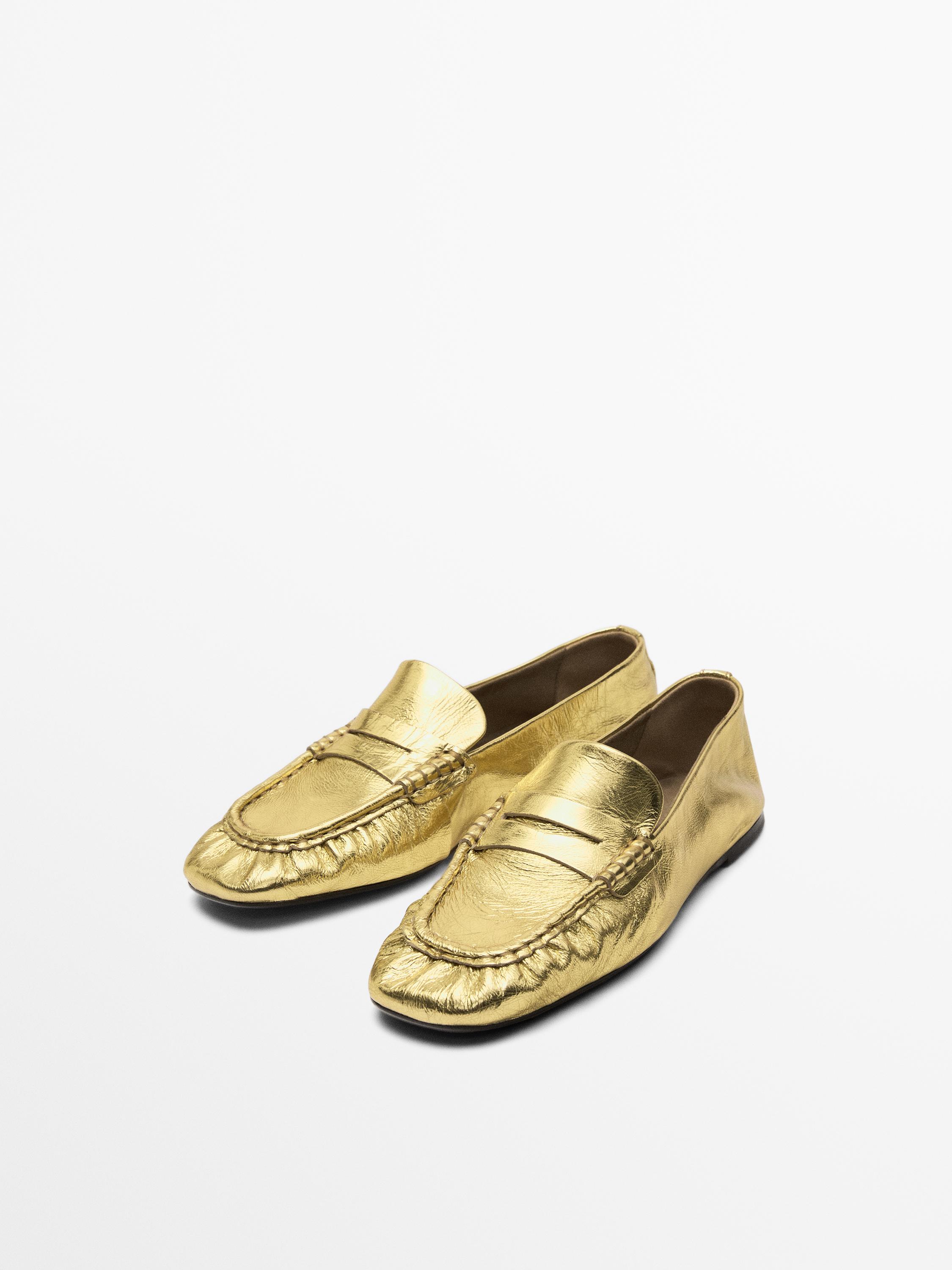 Mocassins dorés avec patte