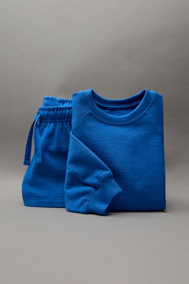 JOGGINGANZUG-GARNITUR MIT SWEATSHIRT UND BERMUDA CASA LAWA © X ZARA KIDS - Bläulich von Zara