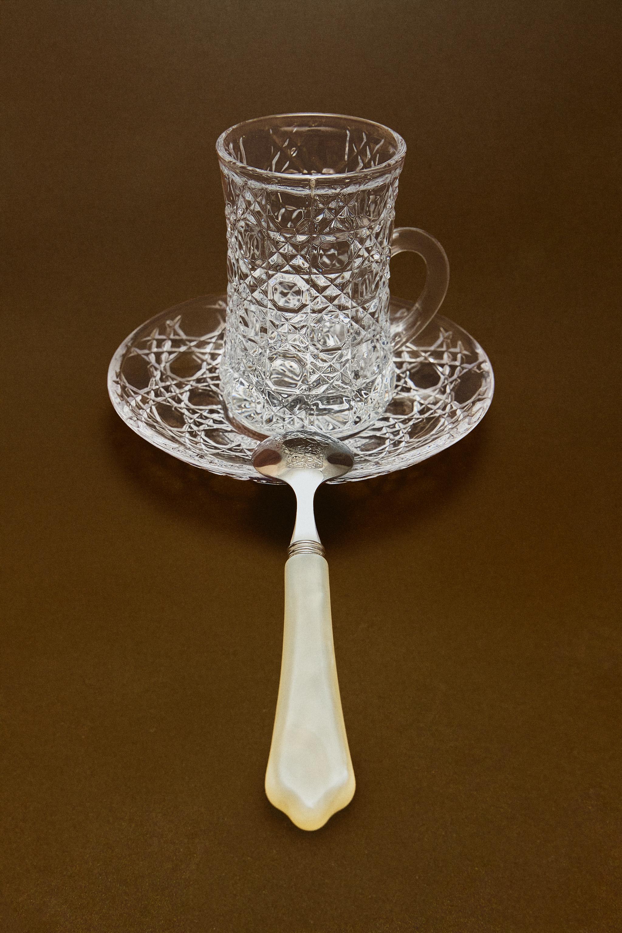 RAISED DESIGN GLASS MUG AND SAUCER — Transparent