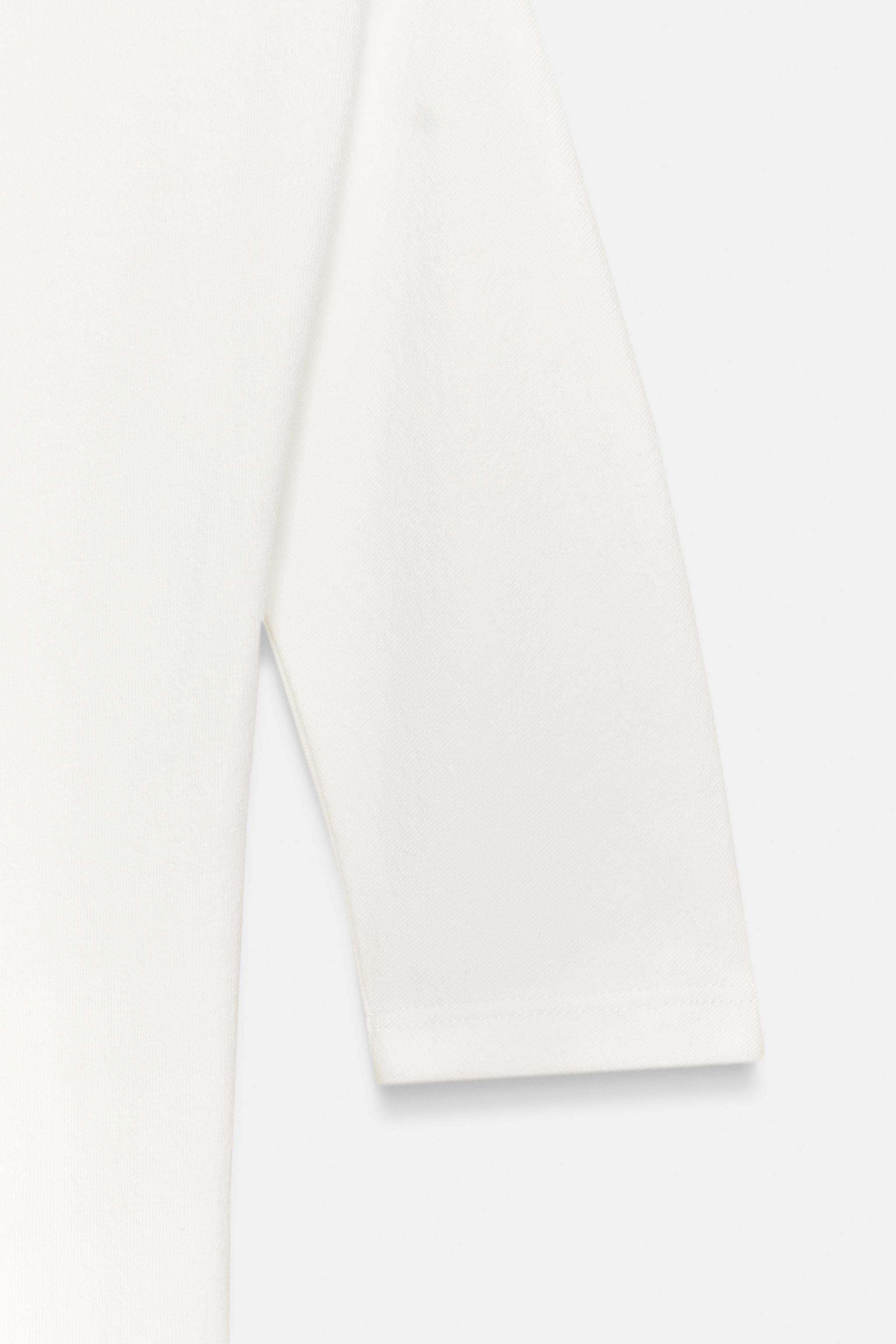 BODY RUSTIQUE À COL MONTANT