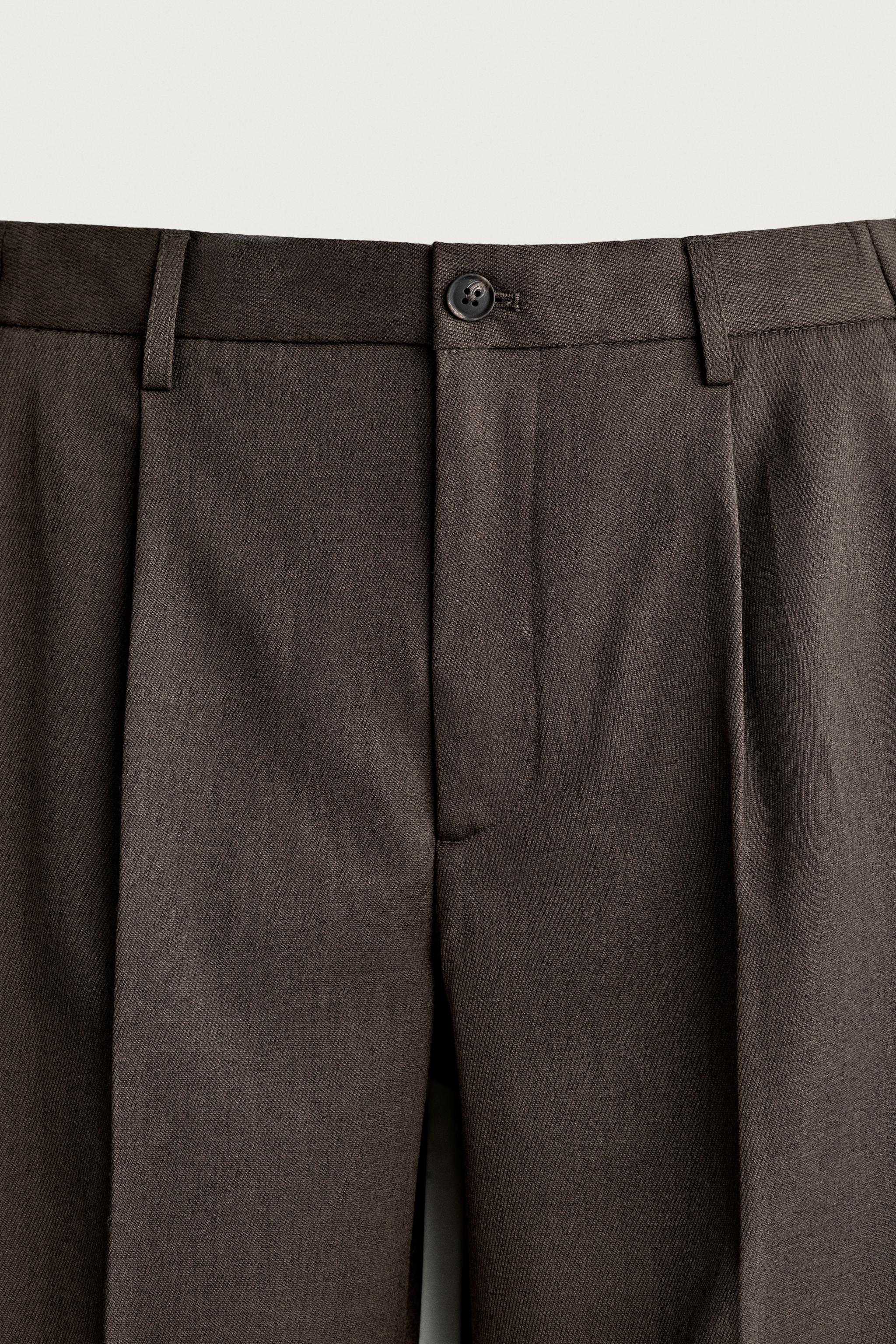 SLIM FIT PLEATED PANTS