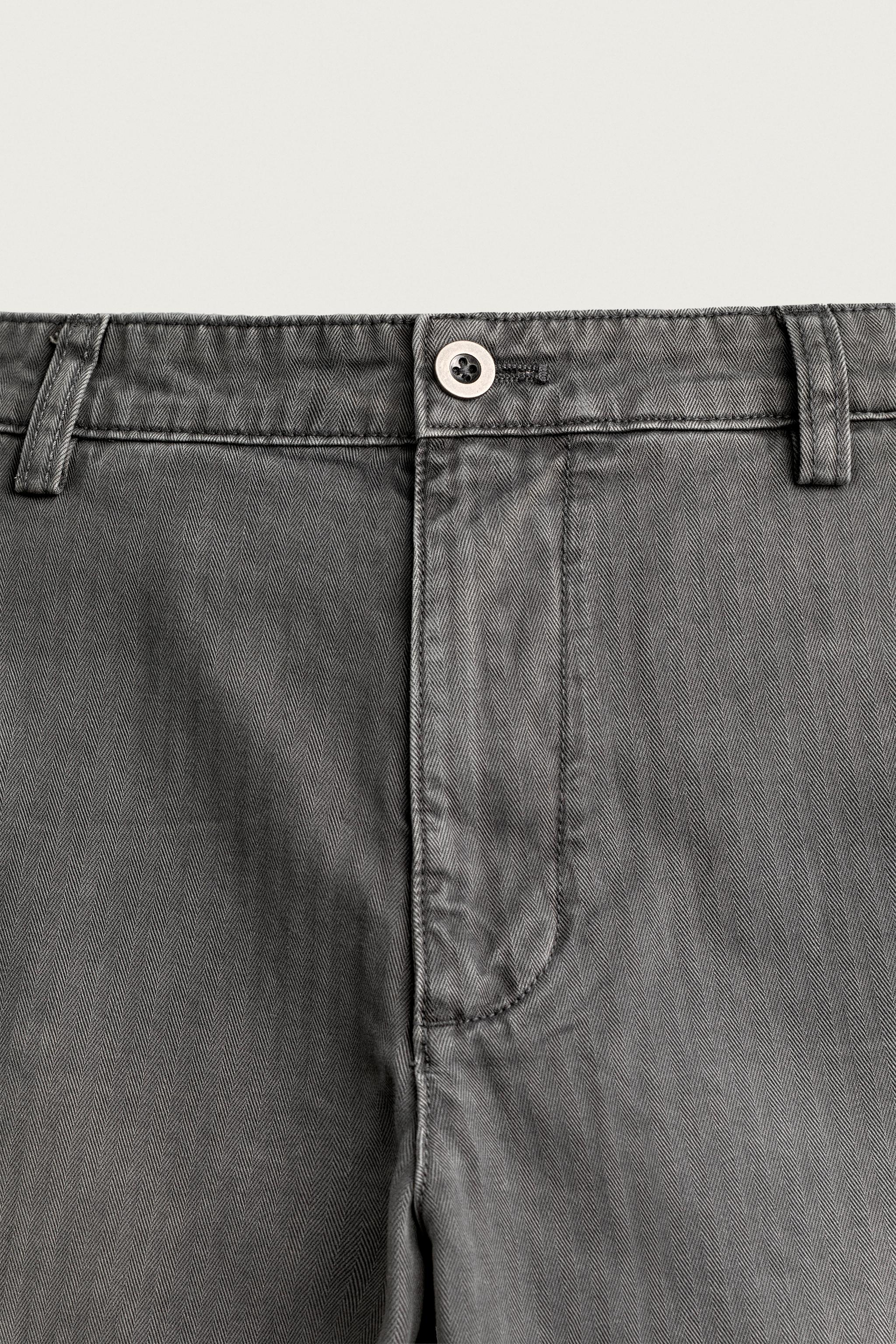PANTALON STRUCTURÉ À CHEVRONS AVEC PATTES