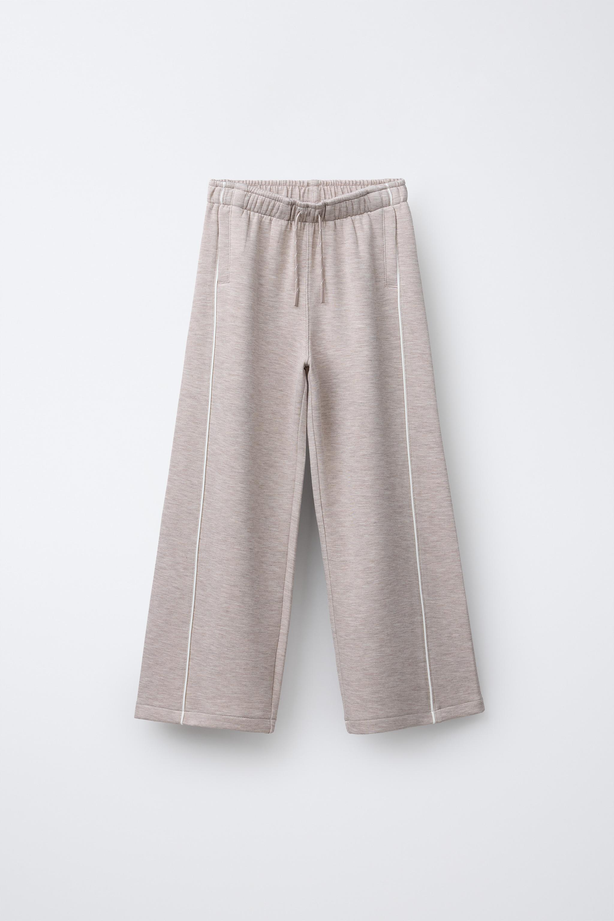 WIDE LEG GYM PANTS WITH CONTRAST PIPING
