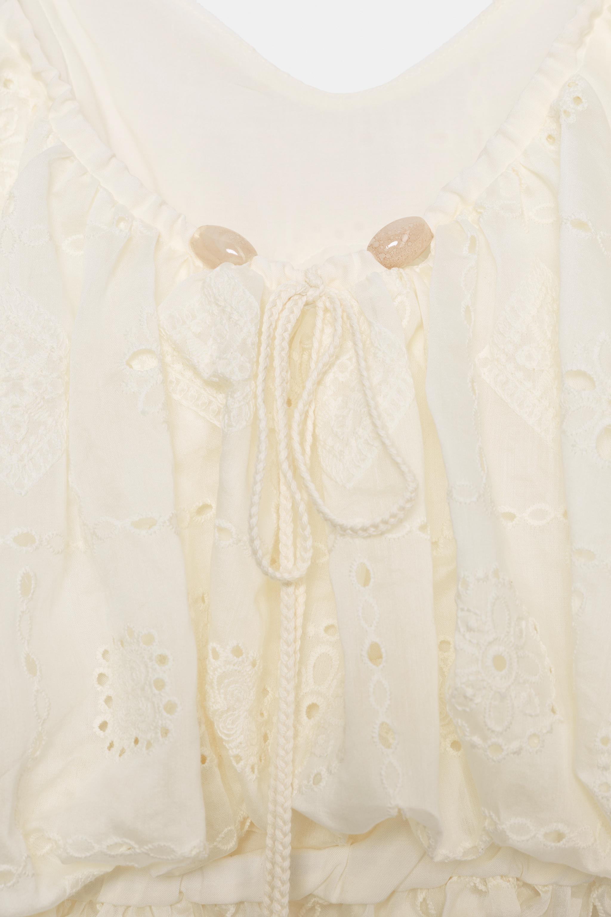 EMBROIDERED EYELET BALLOON TOP