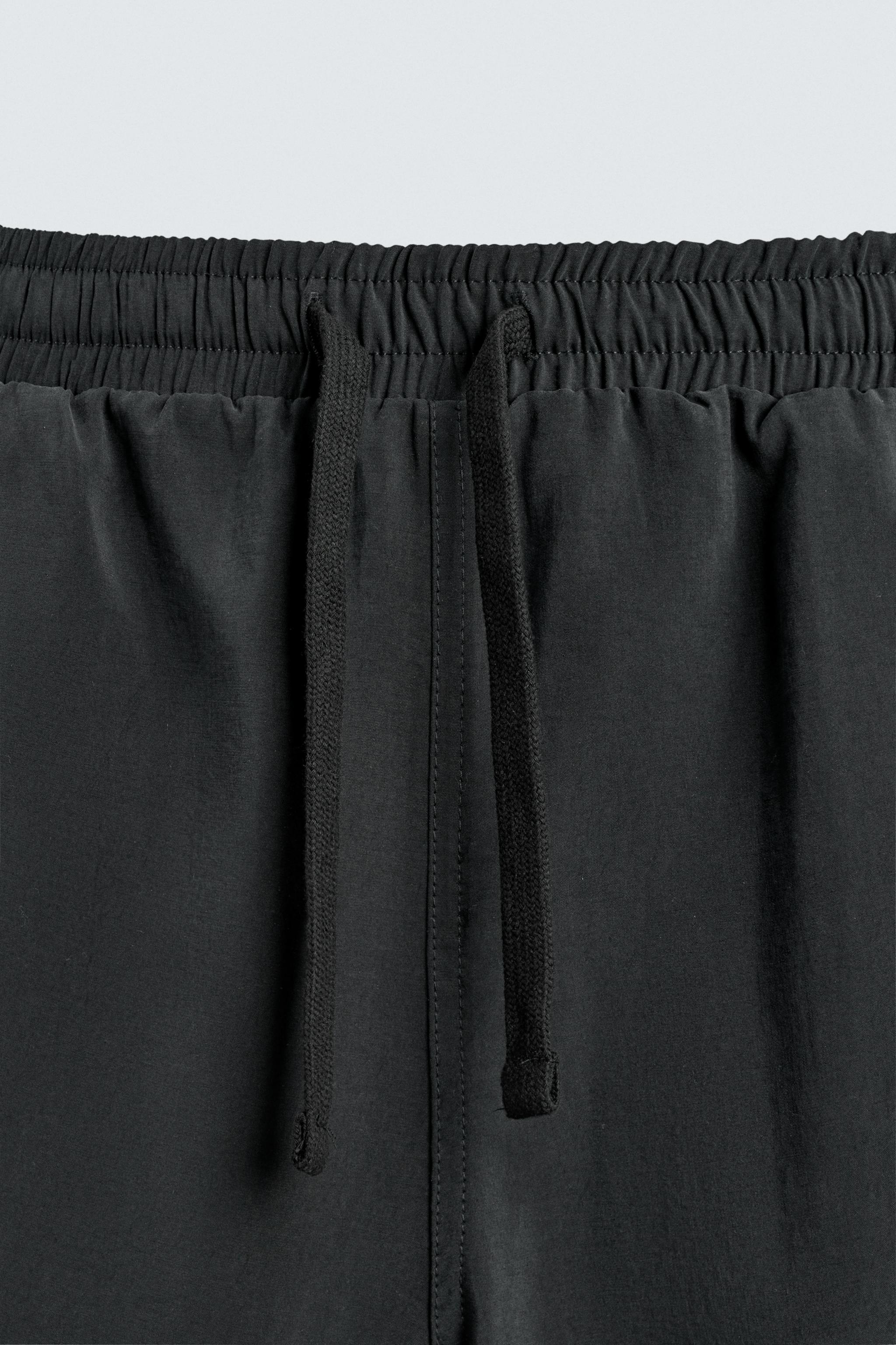 RELAXED FIT FLOWY CARGO SHORTS