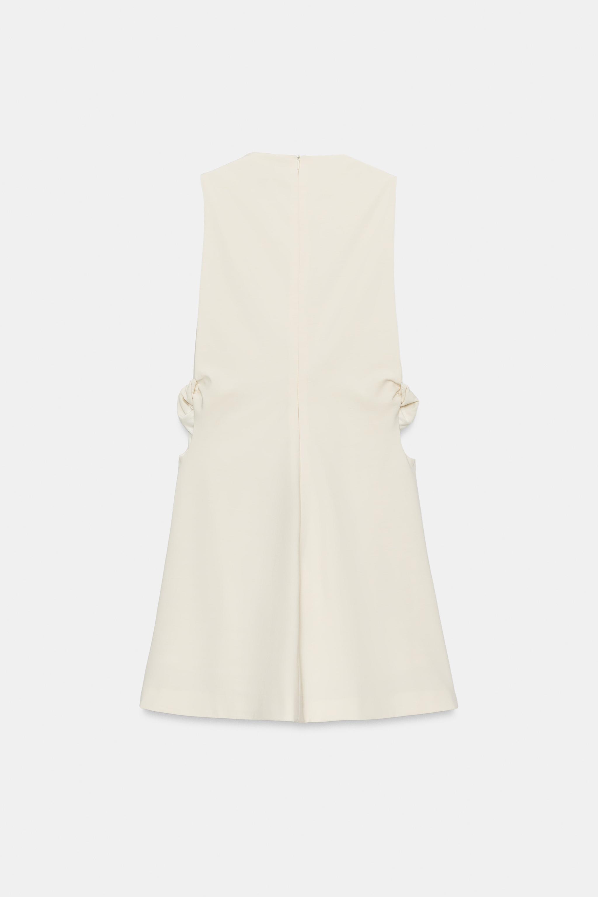 STRETCHY KNOTTED CUT OUT MINI DRESS
