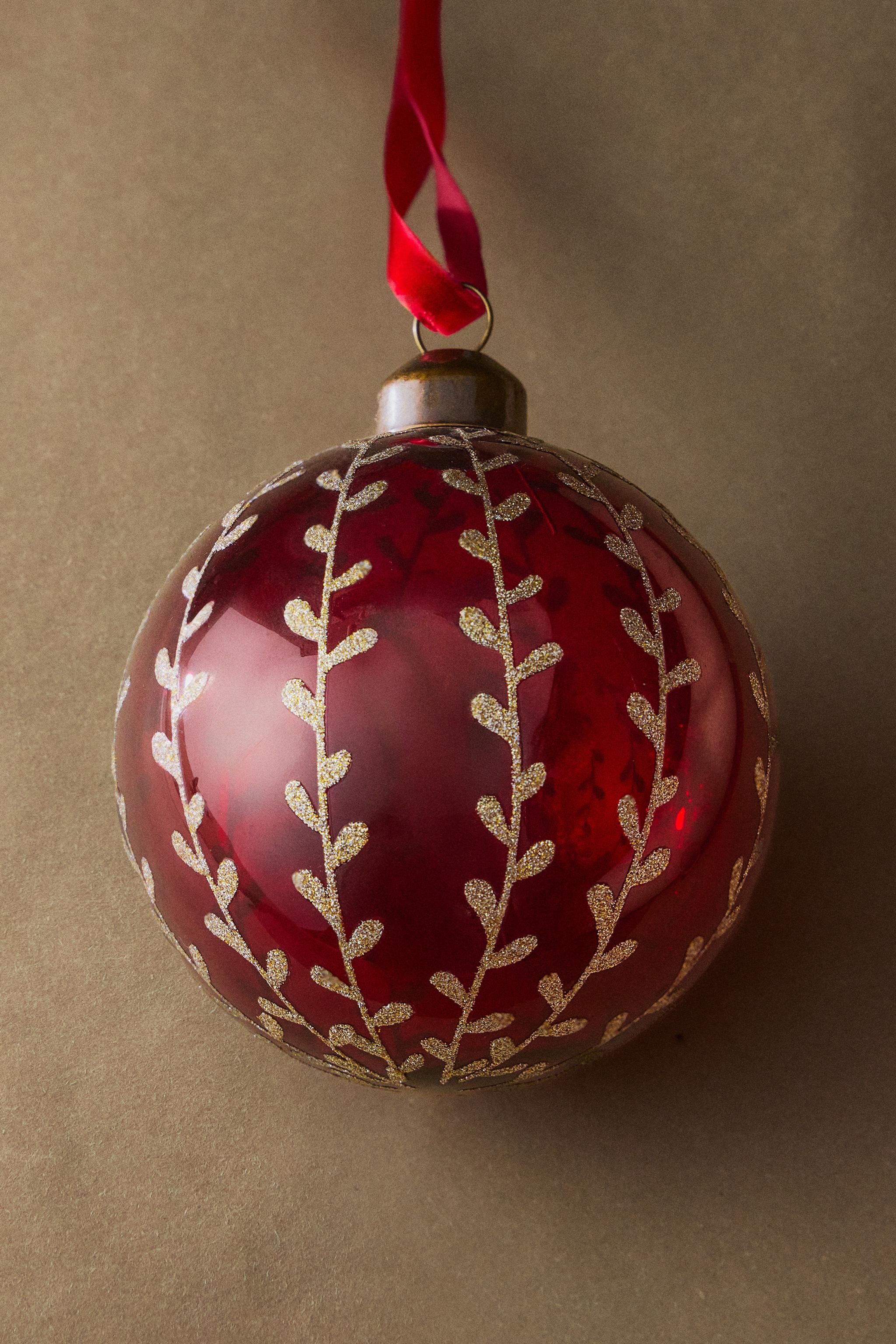 BOULE DE NOËL EN BOROSILICATE FLEURS PAILLETTES