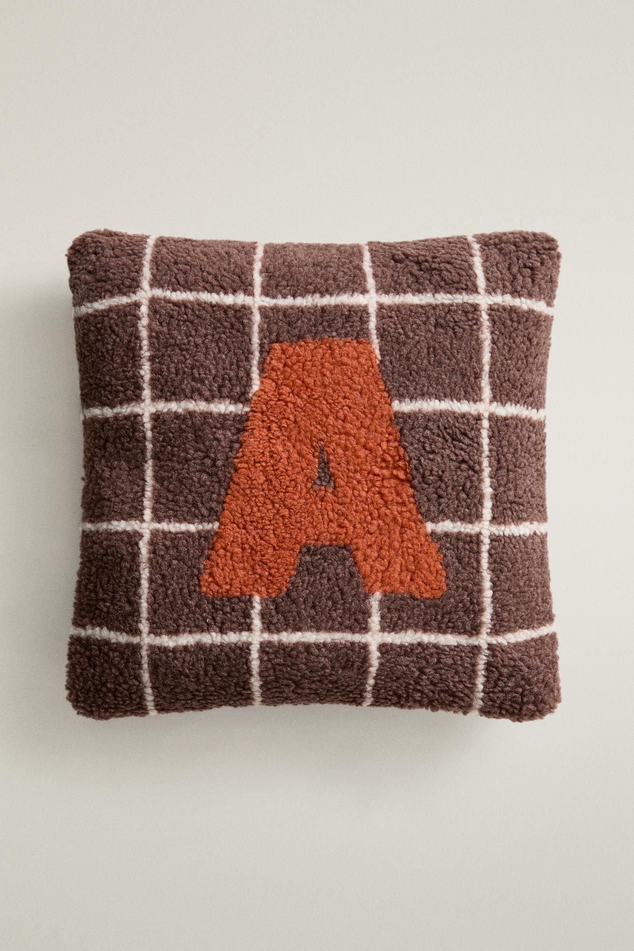 CHILDREN'S FAUX SHEARLING CUSHION WITH A