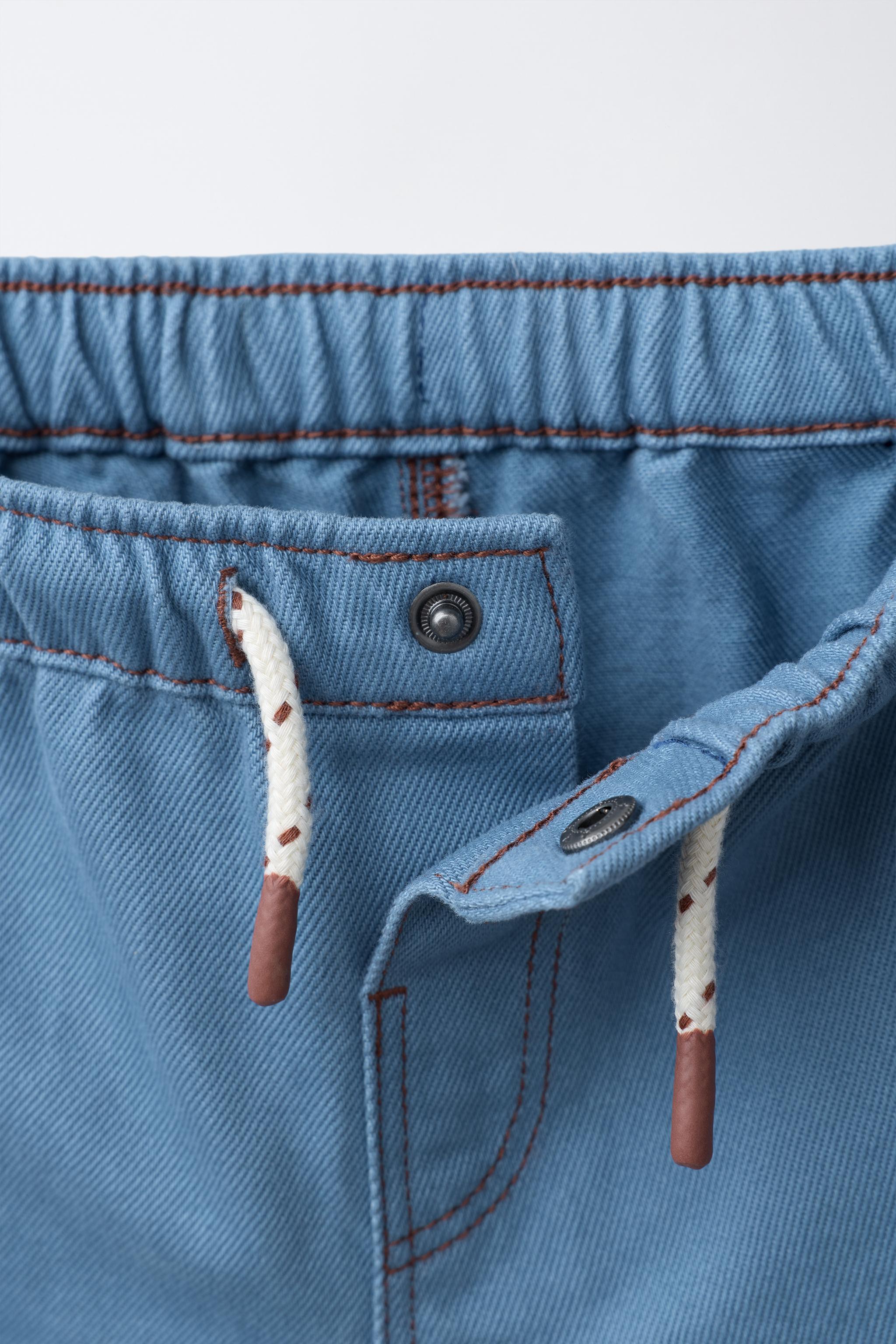 SHORT SURPIQÛRES CONTRASTANTES