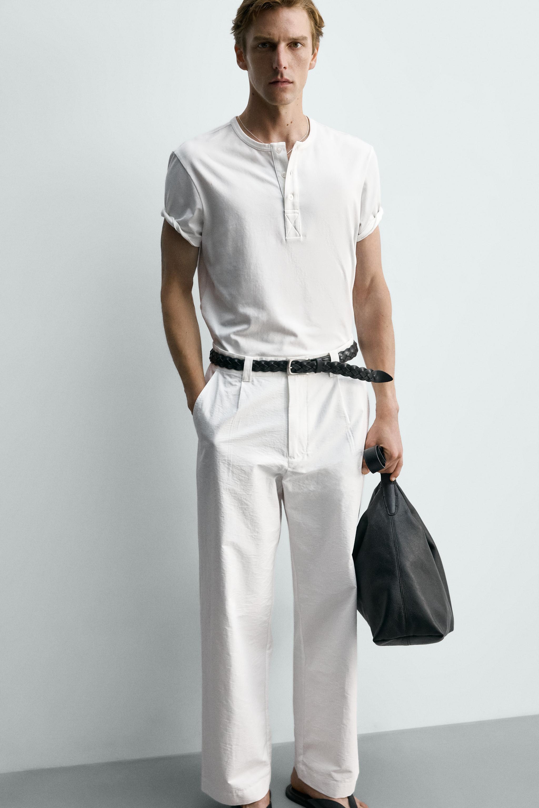 PANTALON COUPE LARGE À PLIS