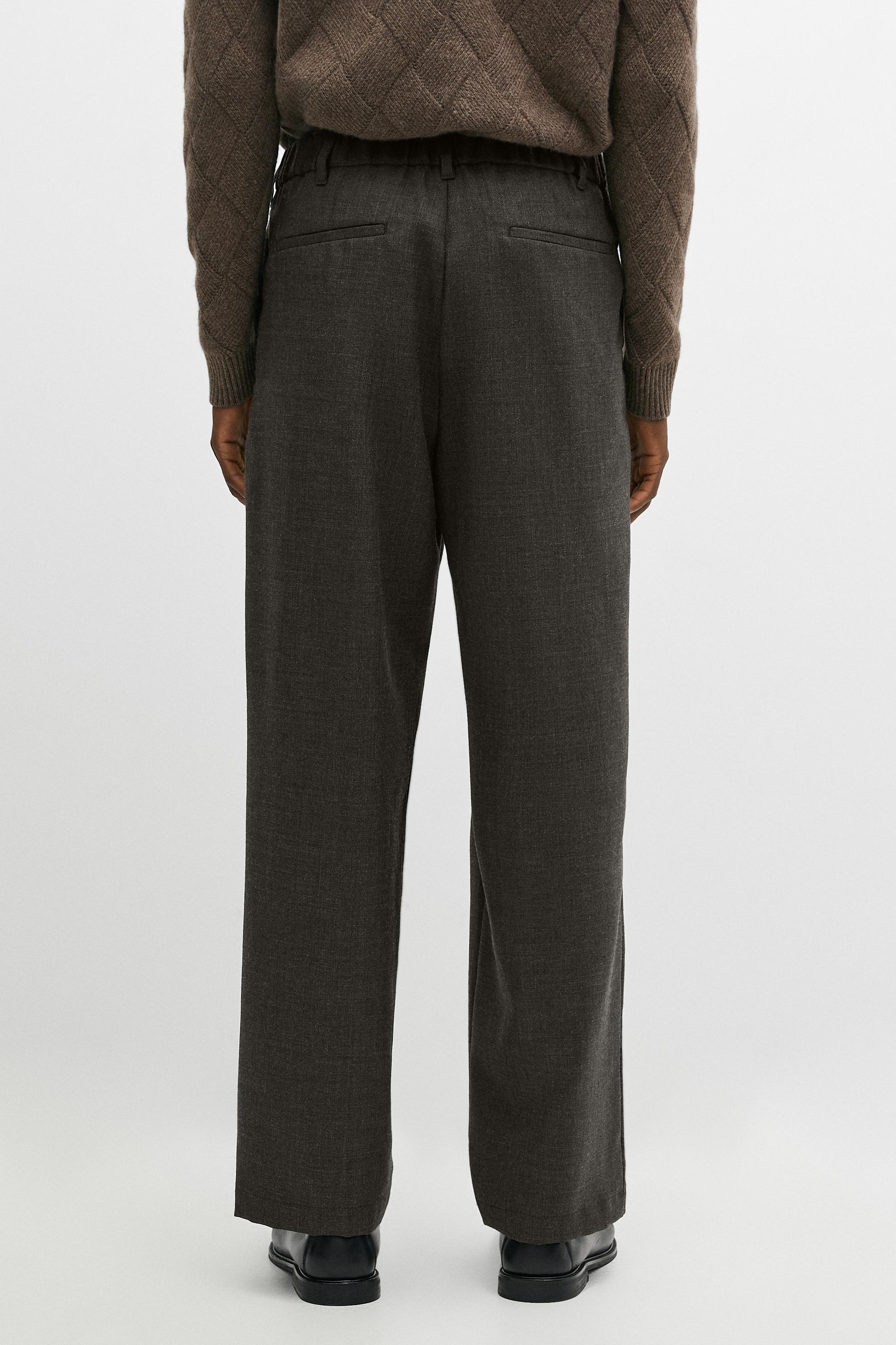Relaxed fit 100% wool pants with elastic waistband
