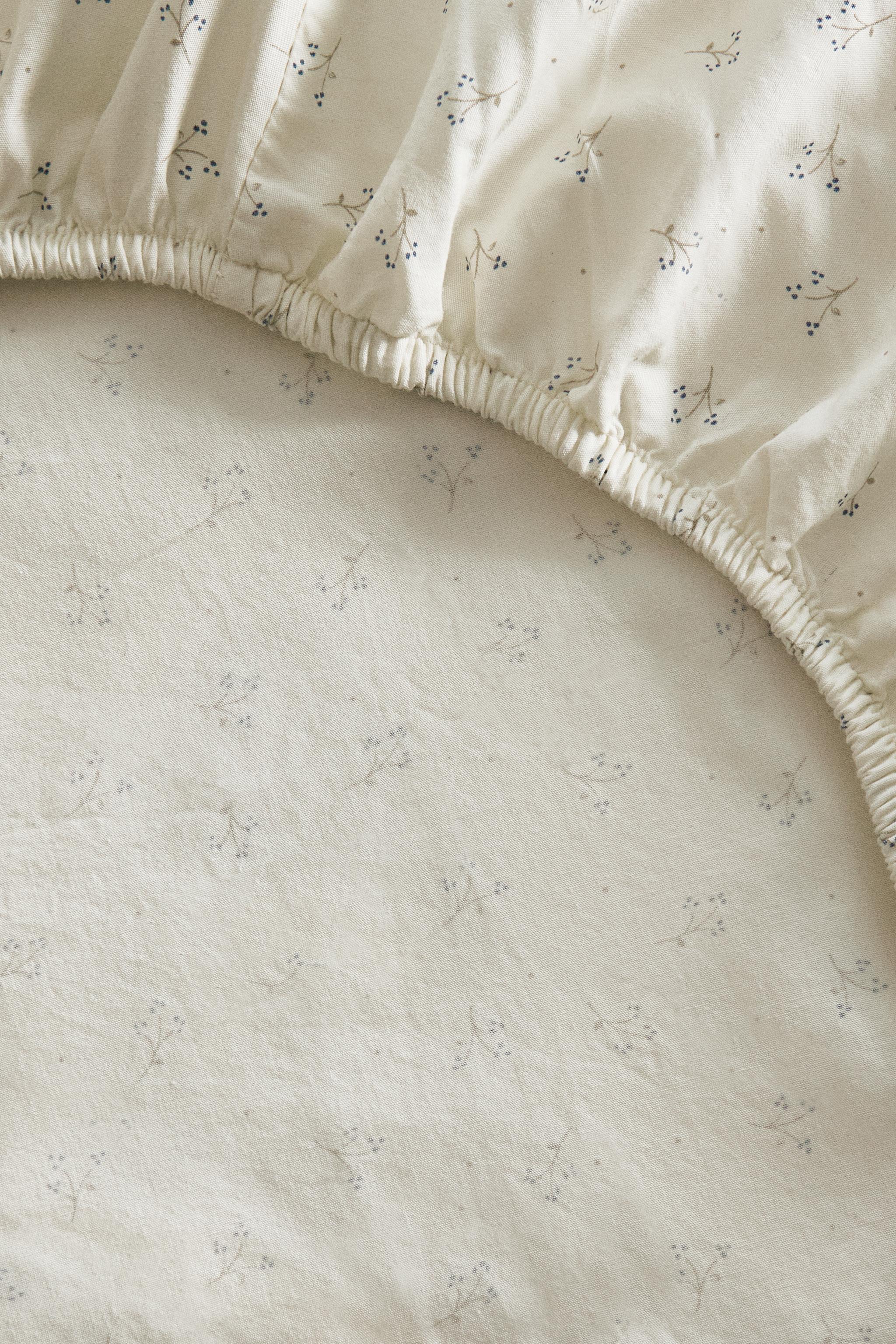 CHILDREN'S COTTON FITTED SHEET WITH MINI FLOWERS