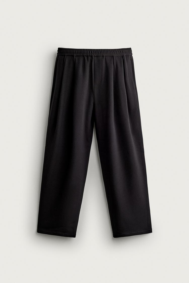 COMFORT RELAXED FIT TROUSERS