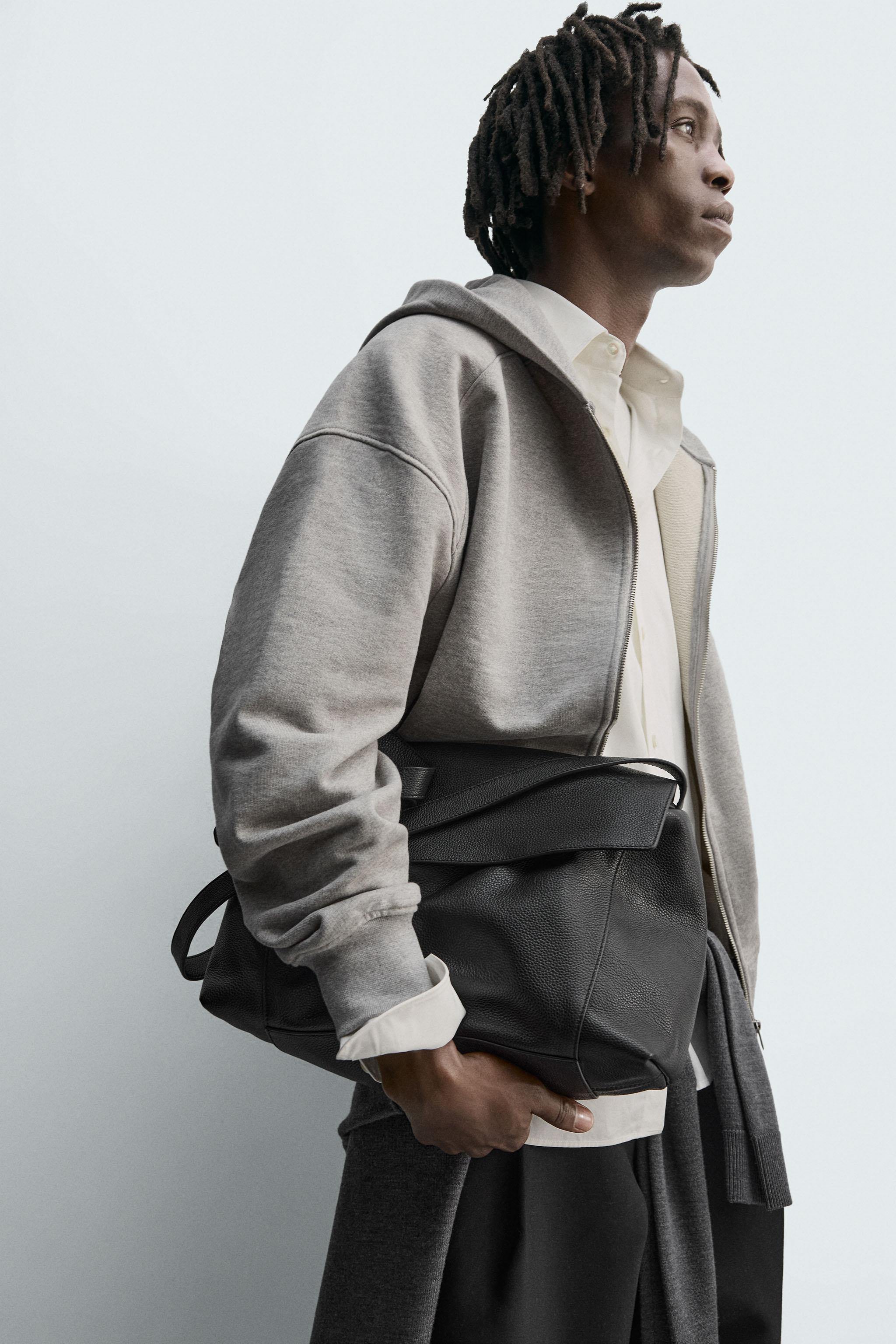 SWEAT ZIPPÉ À CAPUCHE ET ÉTIQUETTE