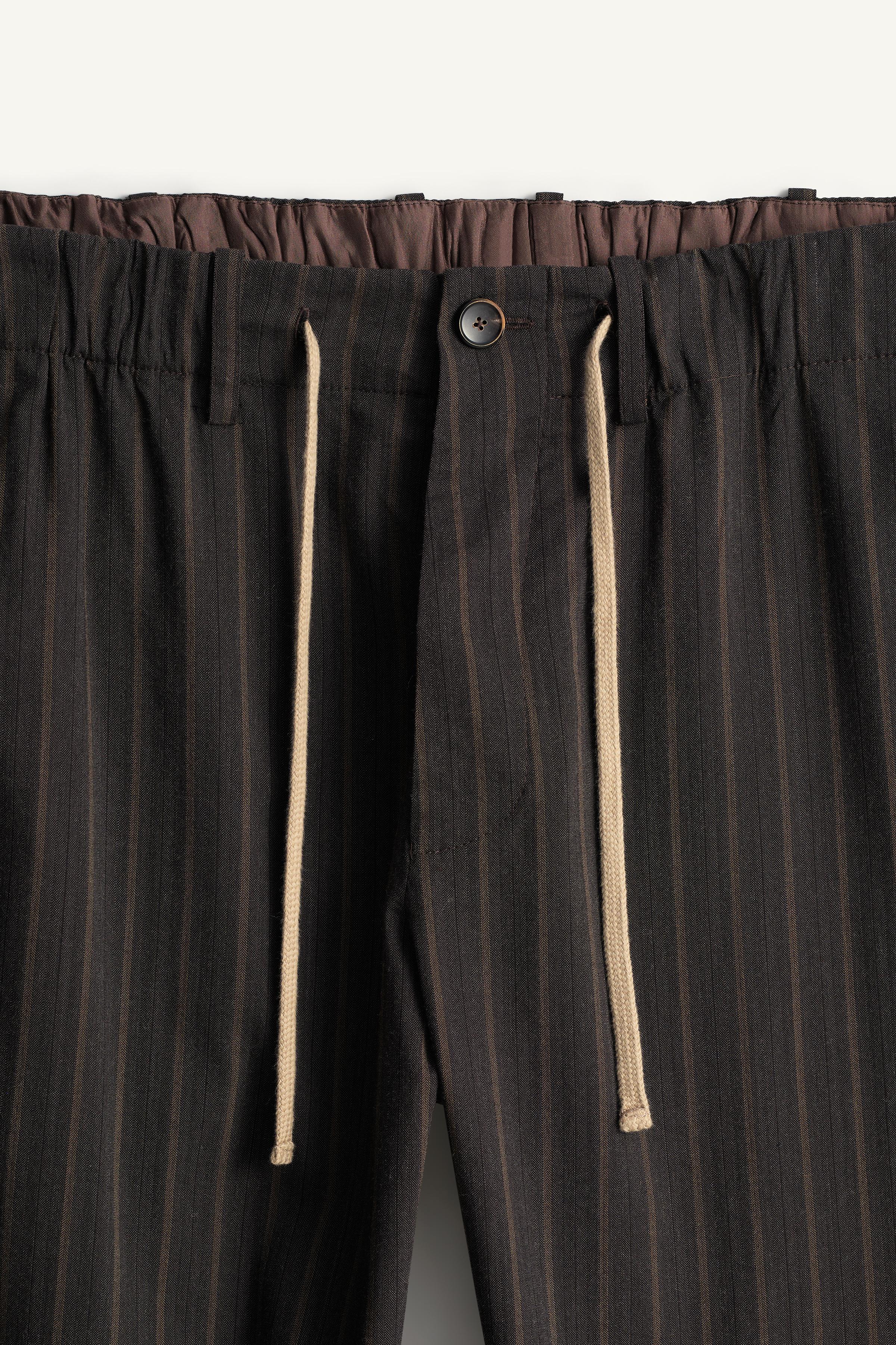 STRIPED RELAXED FIT PANTS