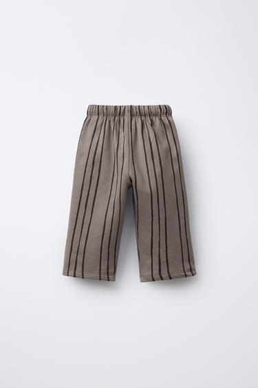PANTALON À RAYURES ET ÉTIQUETTE - marron-vison de Zara - Image 1