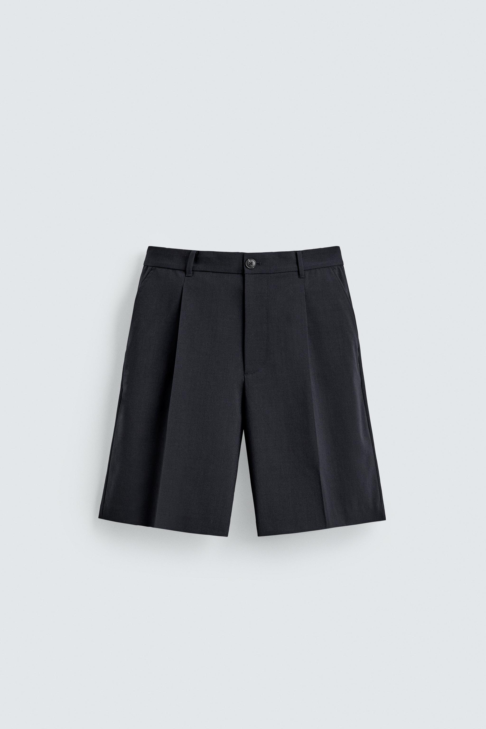 RELAXED FIT PLEATED SUIT SHORTS