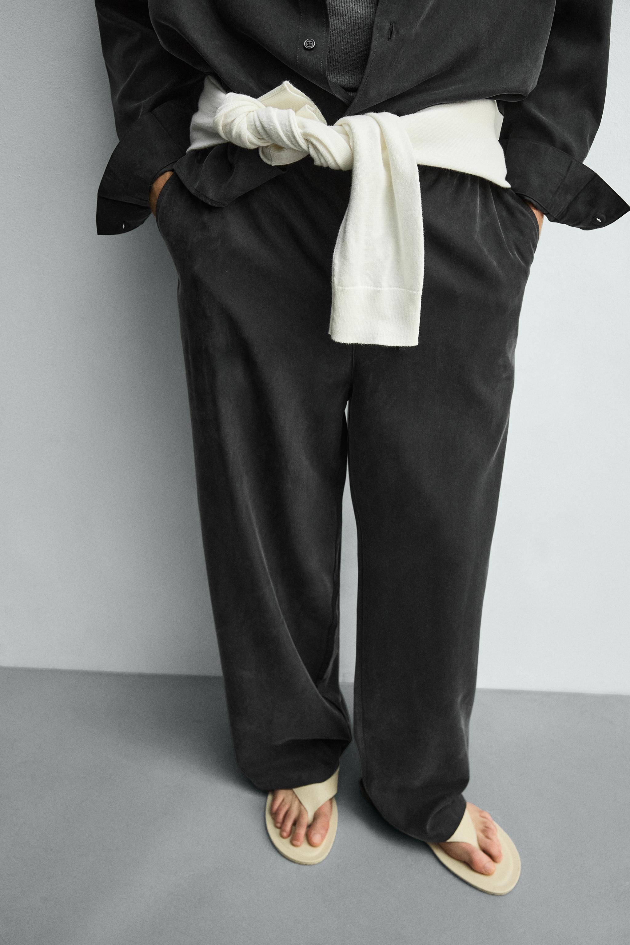 RELAXED FIT FLOWY PANTS