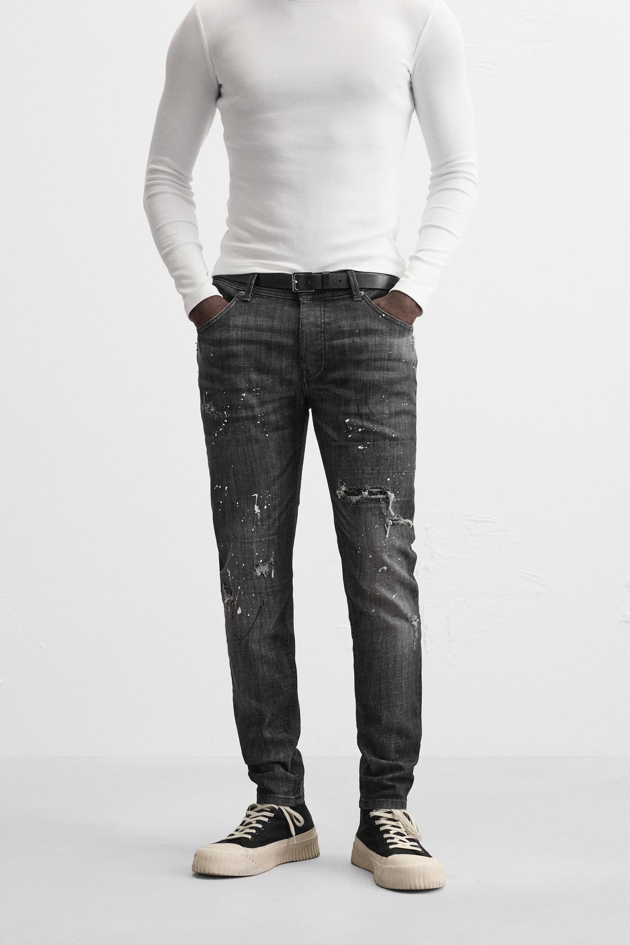 SPLATTERED RIPPED SKINNY JEANS
