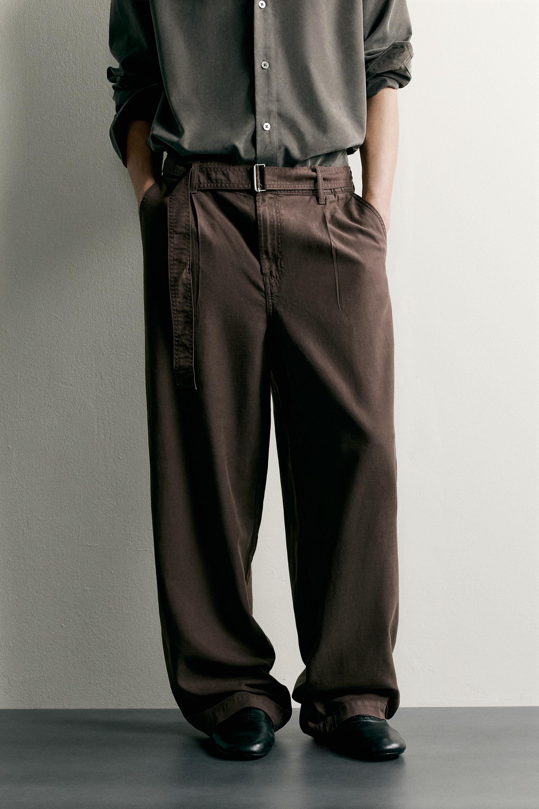 RELAXED FIT BELTED PLEATED PANTS