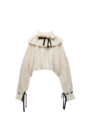 KNIT SWEATER WITH RUFFLE TRIMS