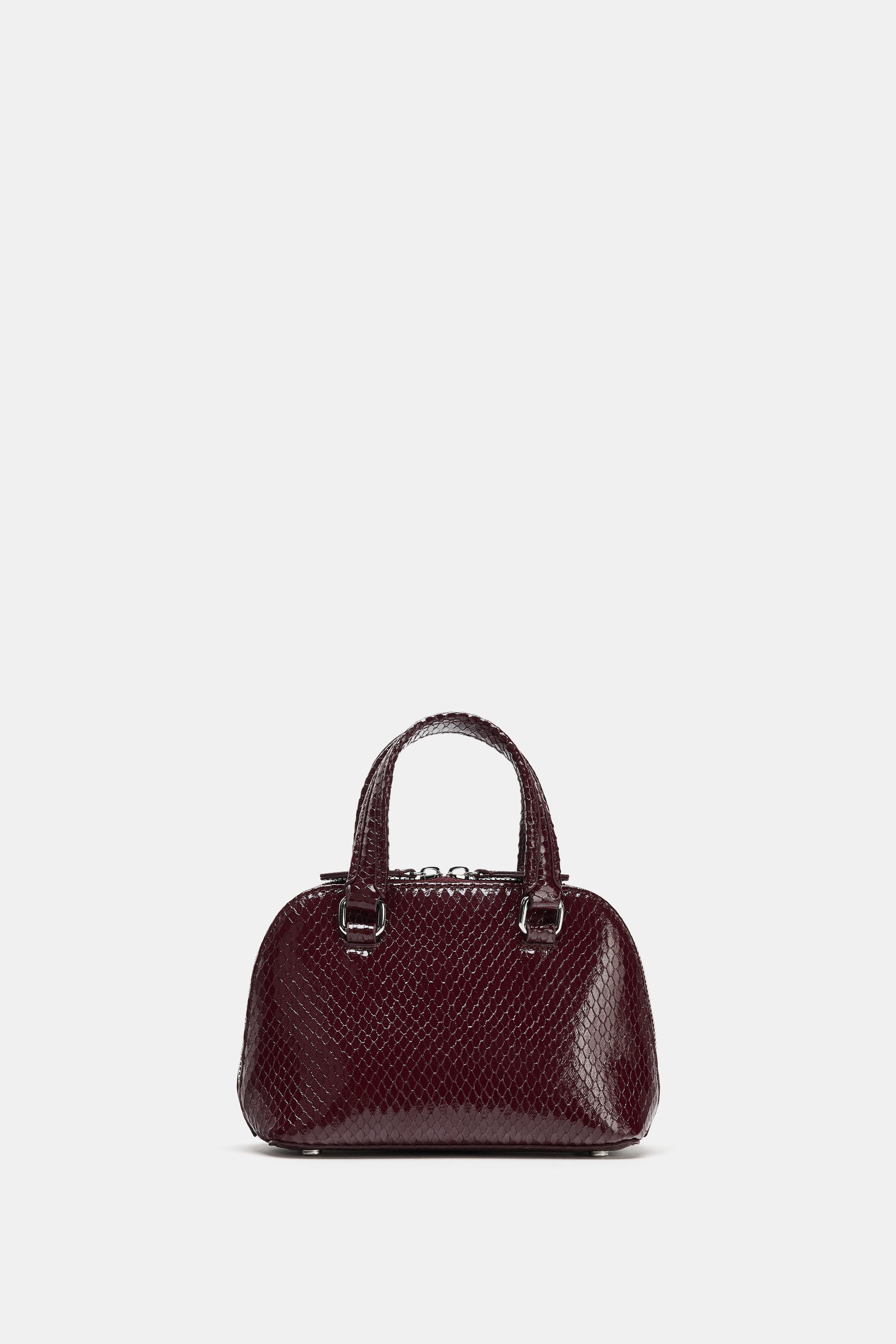 EMBOSSED MINI CITY BAG