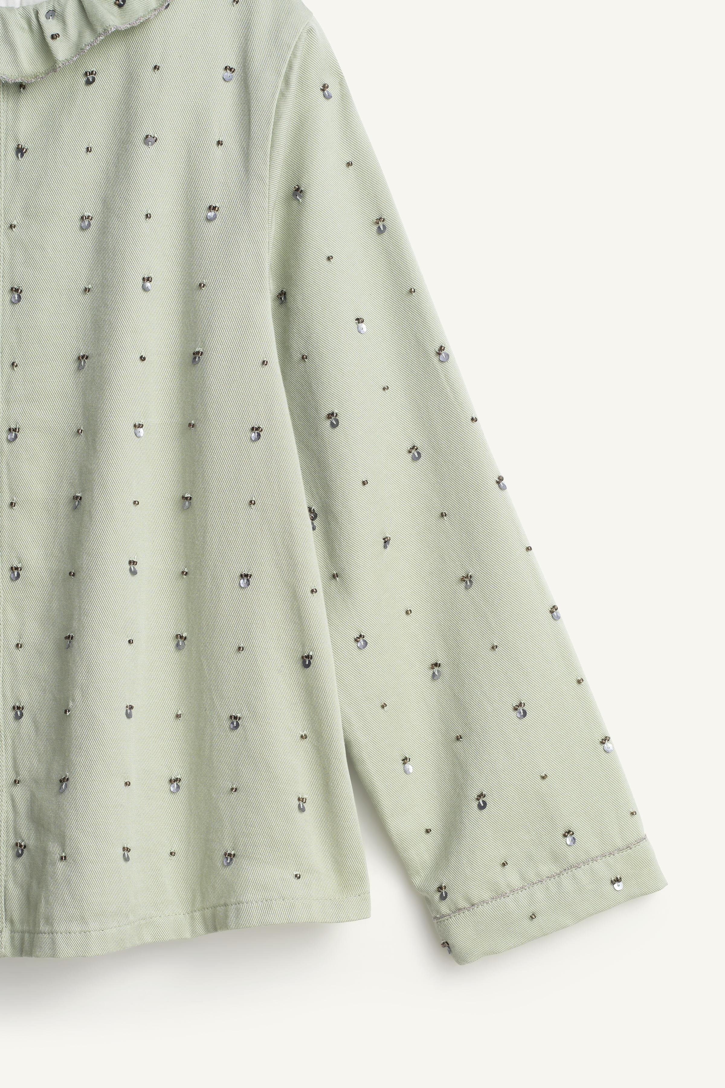 LIMITED EDITION SEQUIN RUFFLE NECK BLOUSE