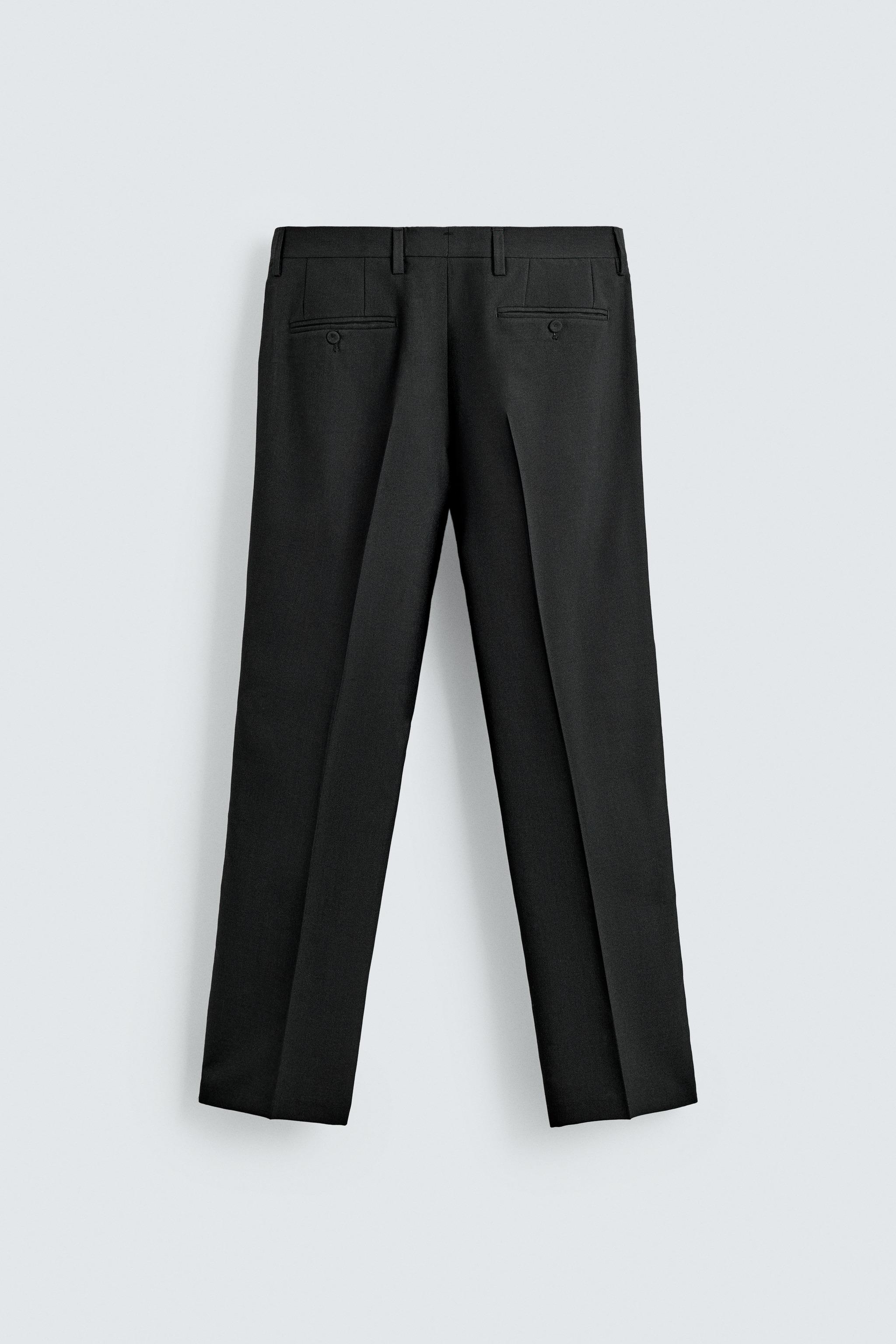 PANTALON DE COSTUME À PLIS