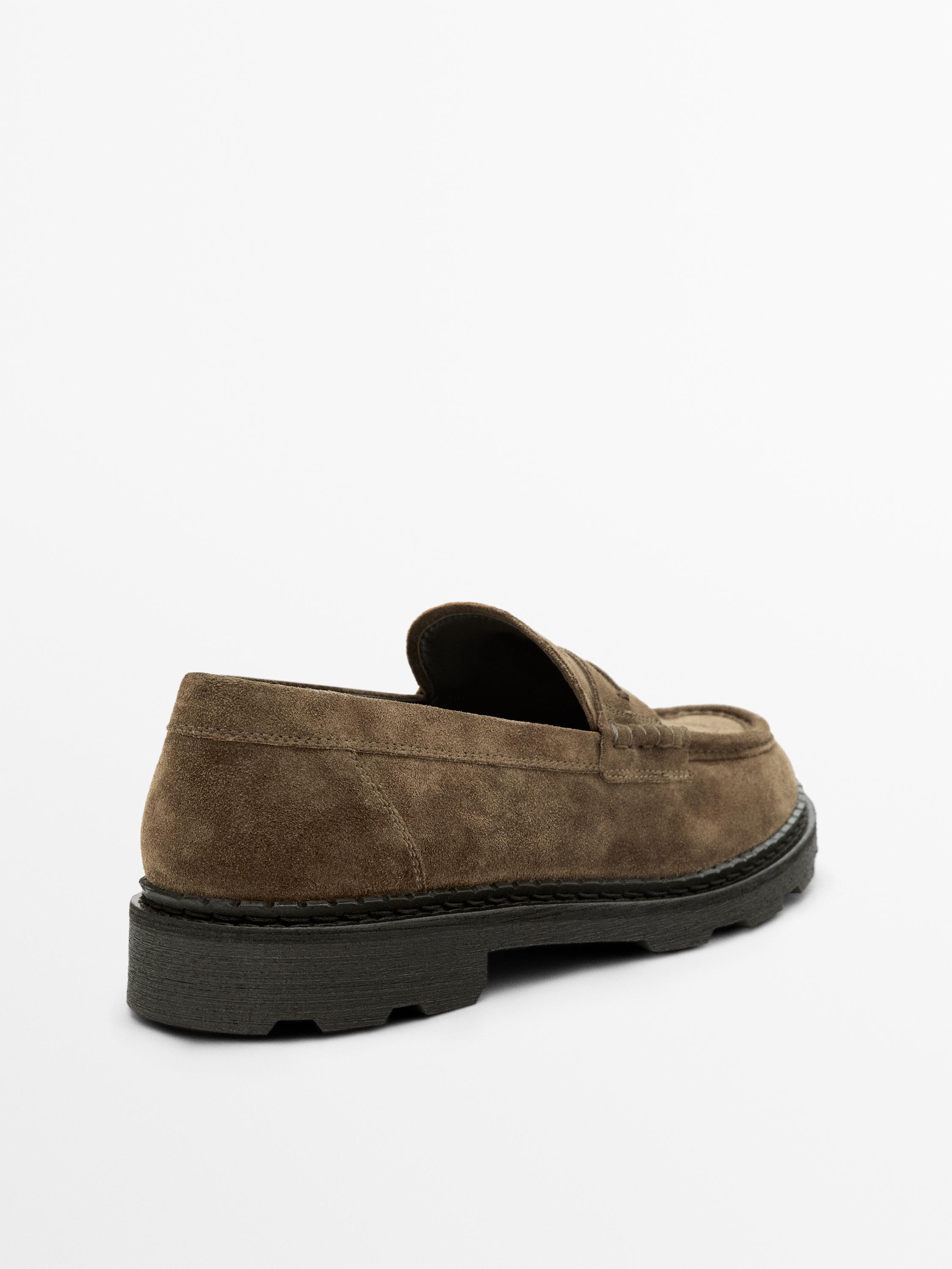 Mocassins en cuir patte décorative semelle crantée