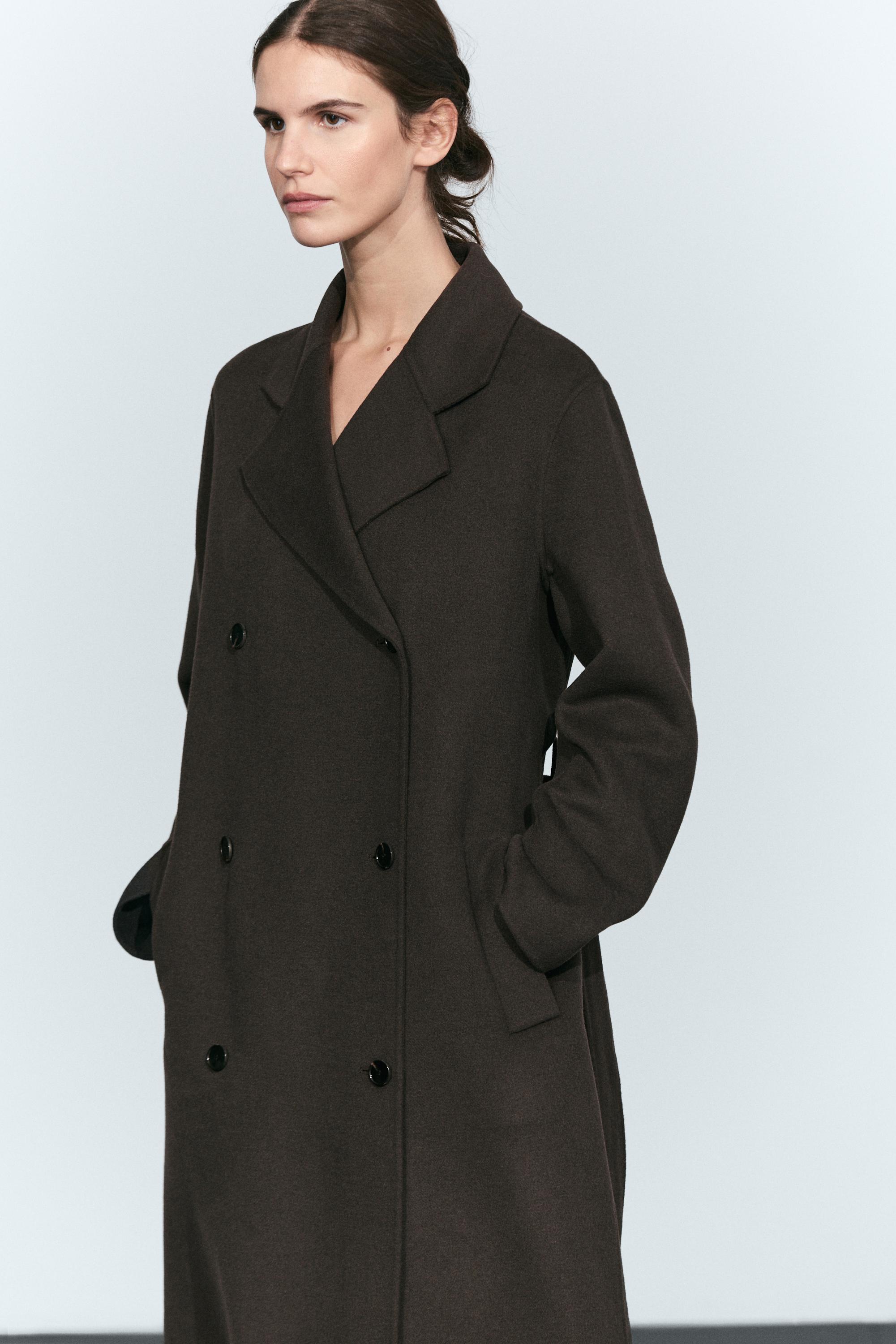 Manteau long croisé détail ceinture