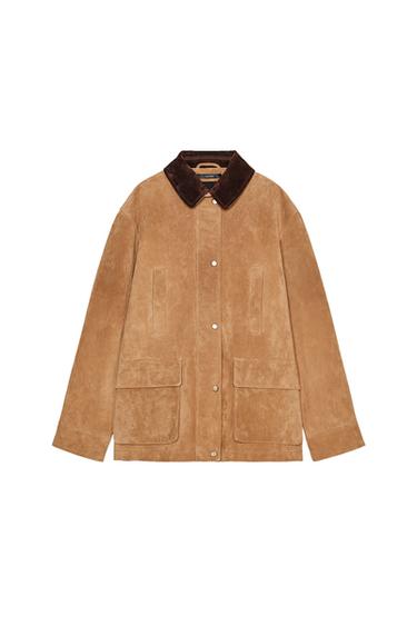 Front view of light brown jacket with dark collar and front pockets.