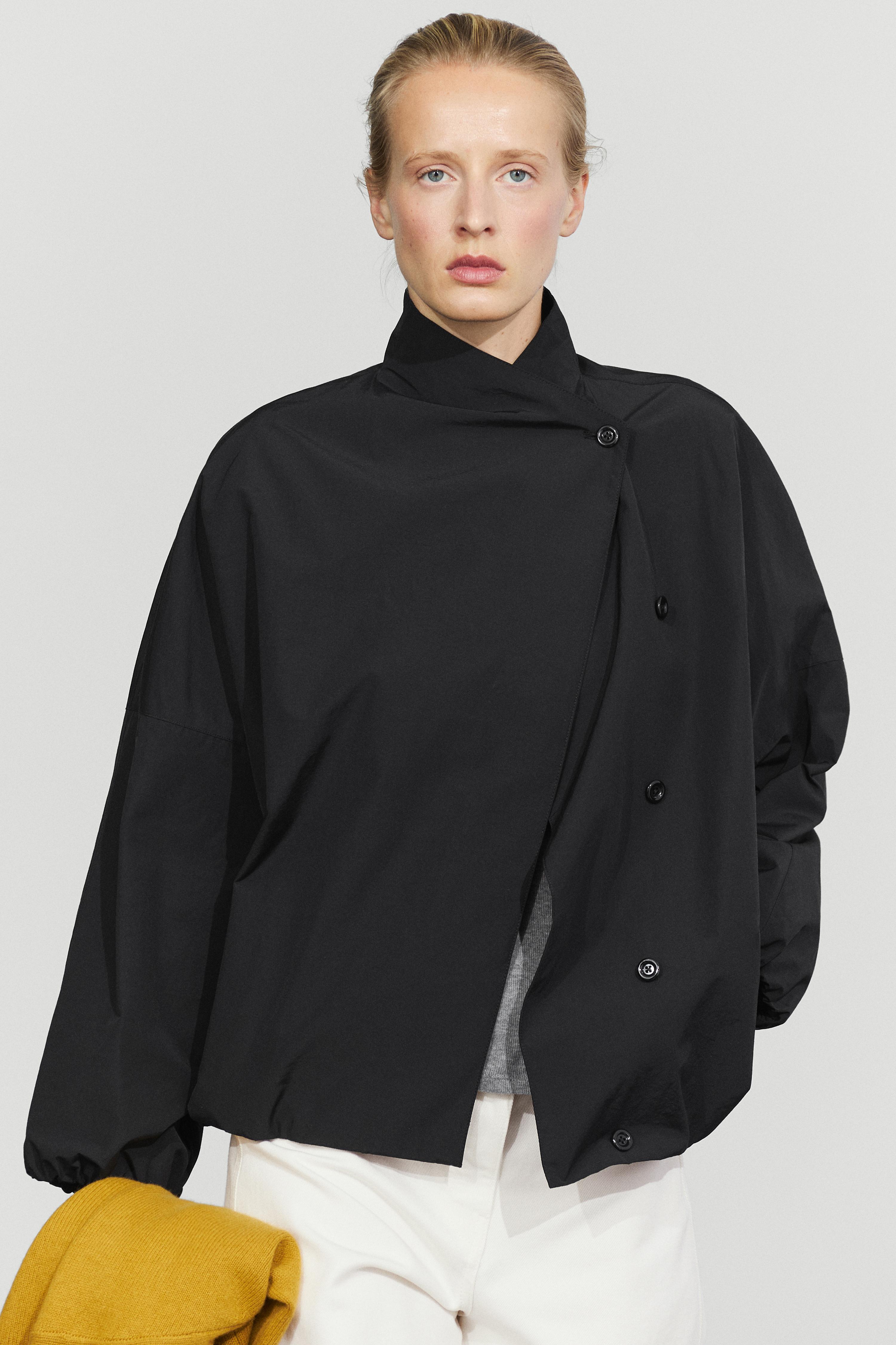Technical bomber jacket with side button