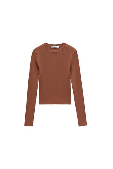 KNIT SWEATER WITH SHOULDER PADS