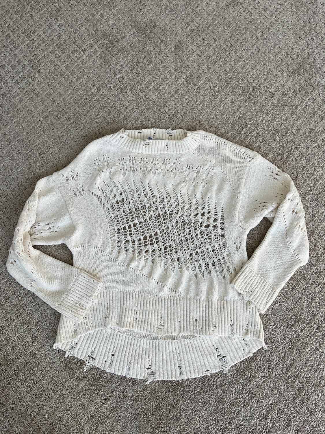 TORN EFFECT KNIT SWEATER