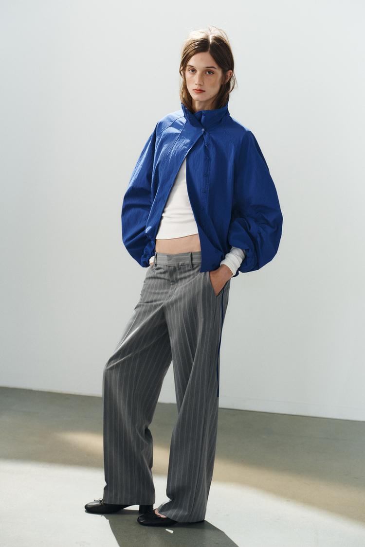 Chaqueta de tela técnica con botones 5