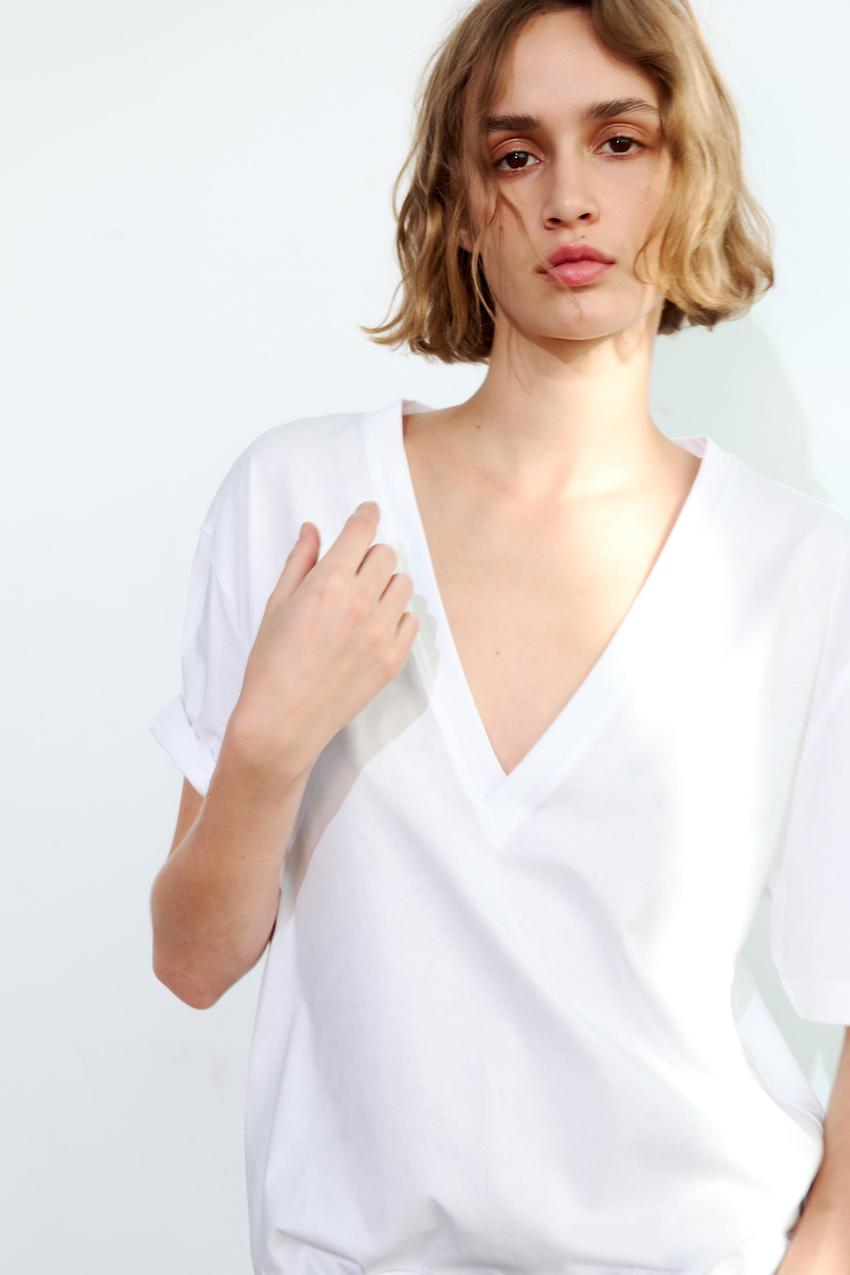 Camiseta de algodón de cuello pico y manga corta para mujer