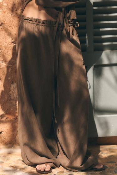 بنطلون PALAZZO بربطة - بني داكن الخاص بـ Zara