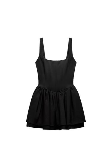 Sleeveless black dress with a square neckline and a flared skirt. White background.