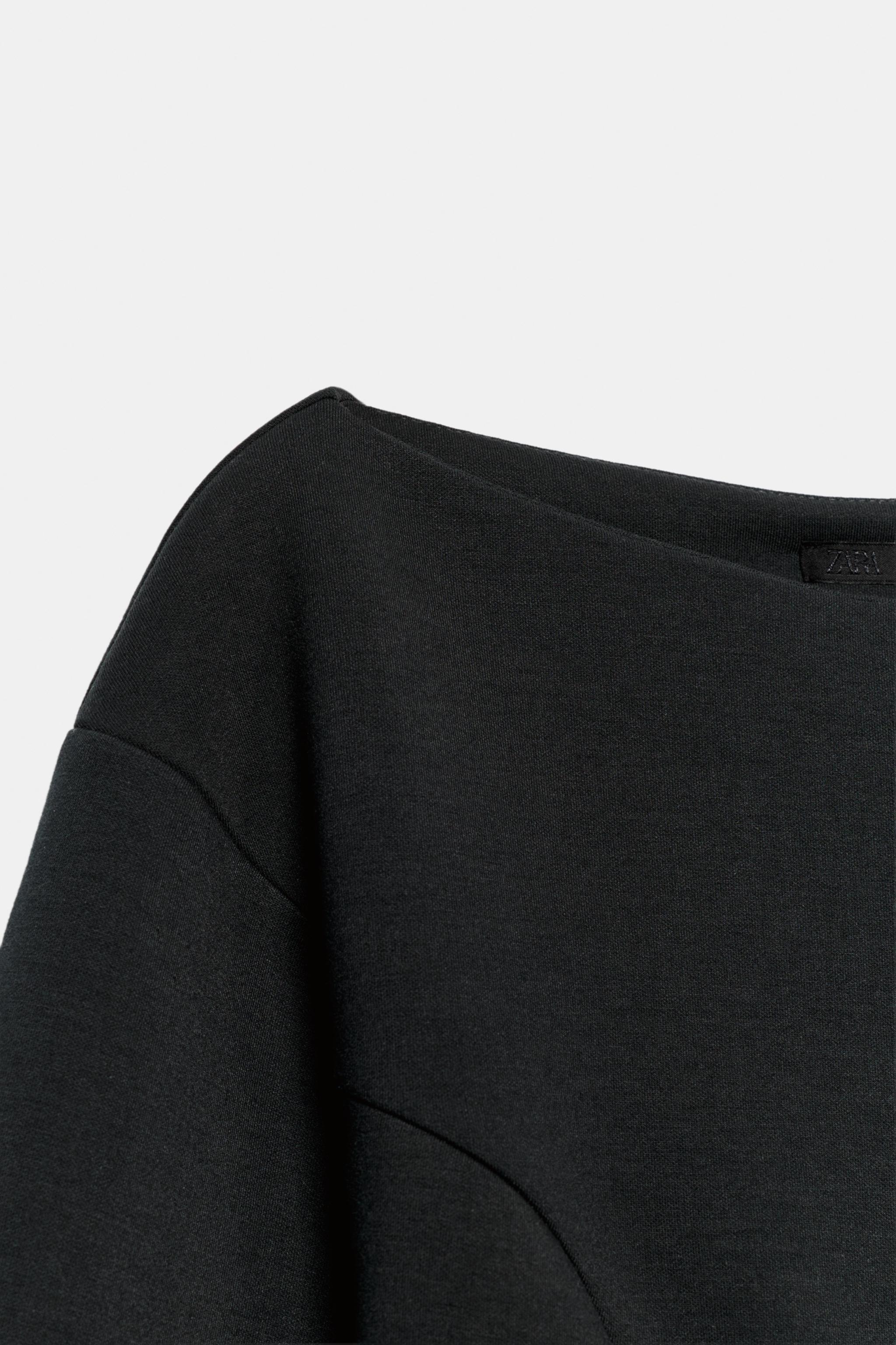 VOLUMINOUS TECHNICAL SWEATSHIRT