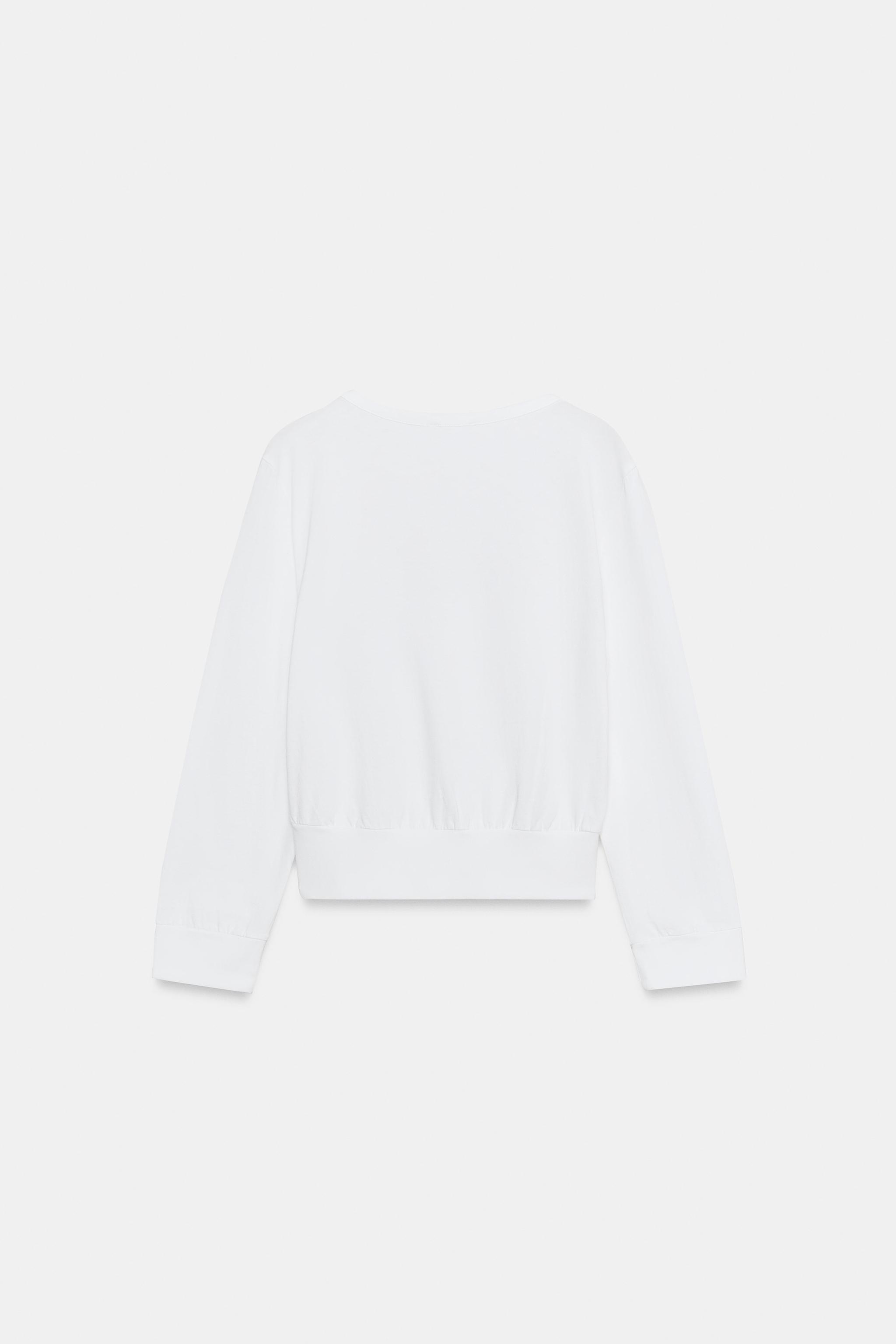 V-NECK BUTTON-UP TOP