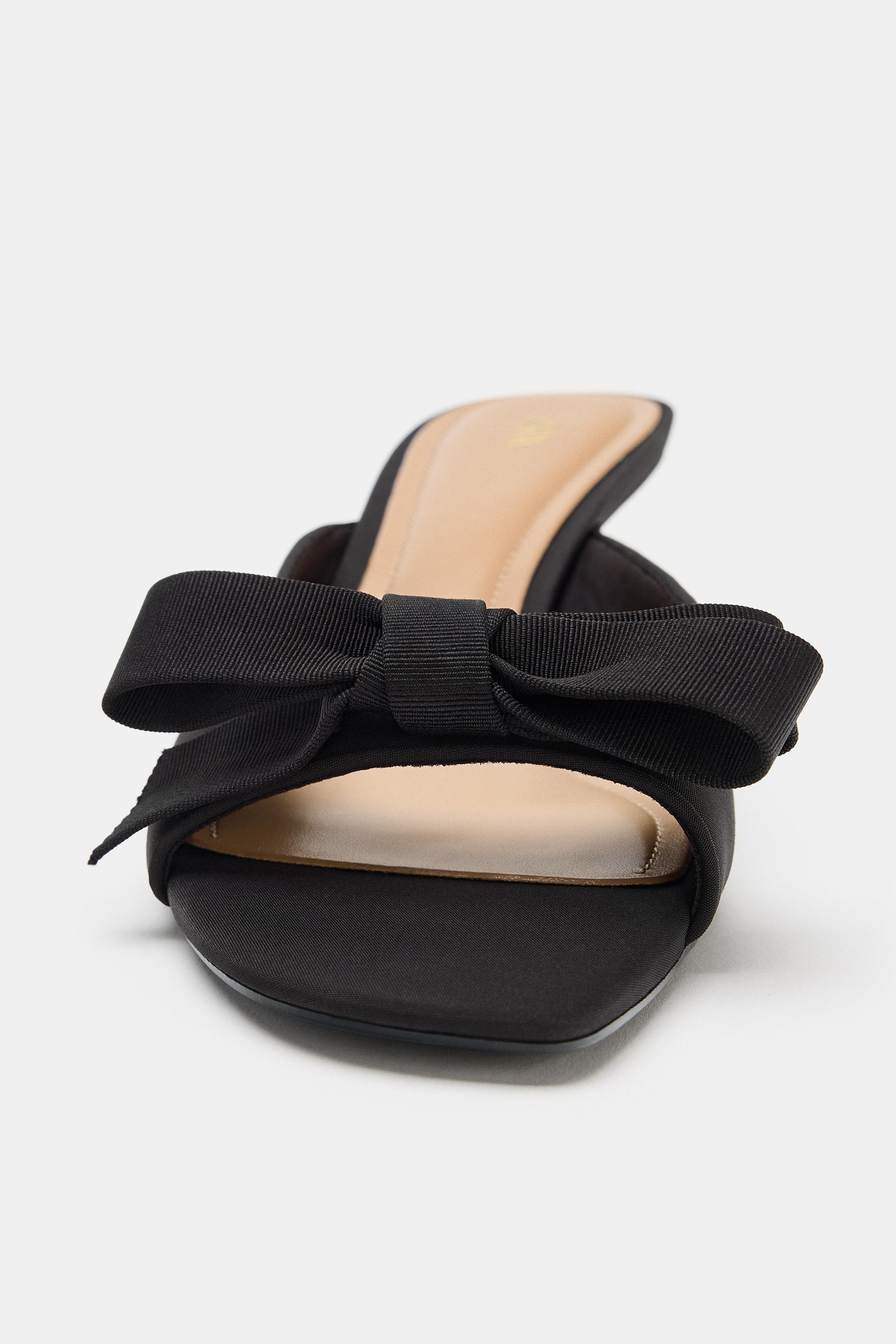 BOW HEELED SANDALS